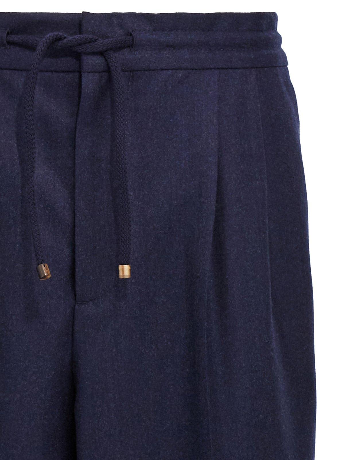 Shop Brunello Cucinelli Pleated Tapered Leg Trousers In Blue