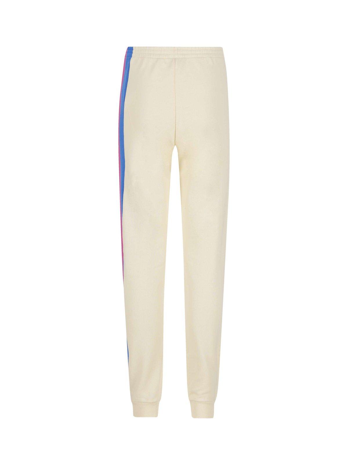 Shop Gucci Logo Printed Striped Joggers In Sunkissed
