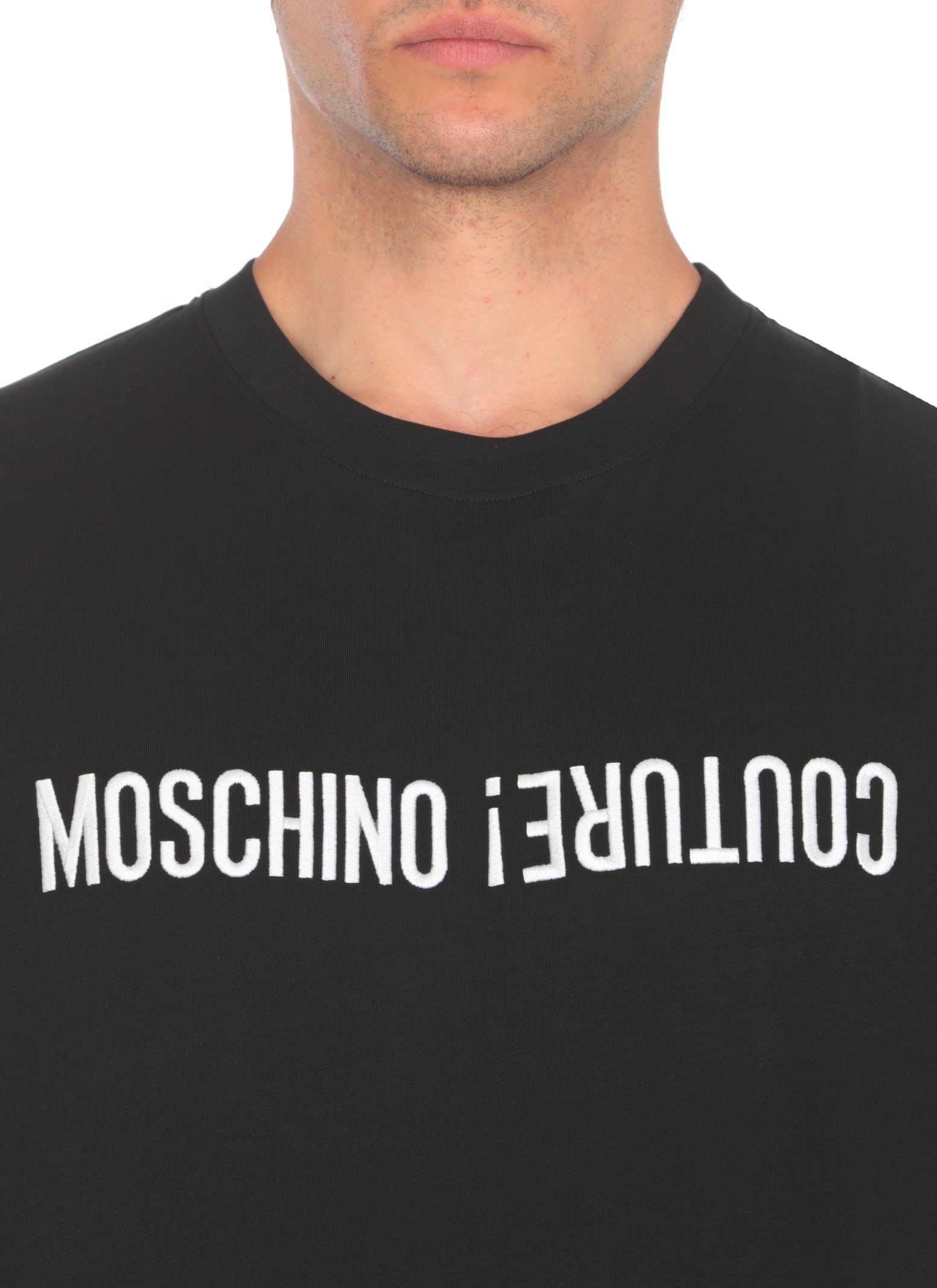 Shop Moschino Logoed T-shirt In Black