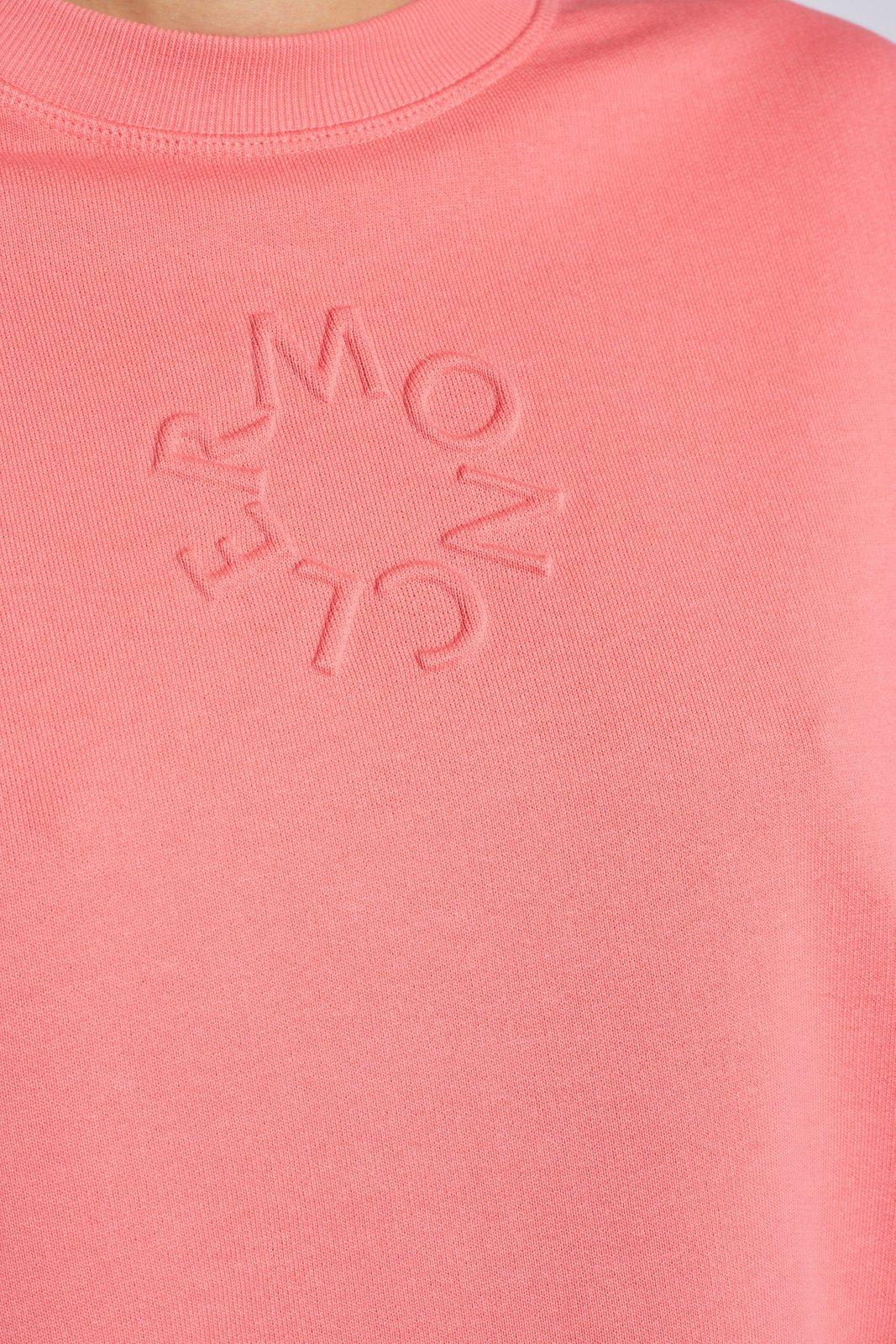 Shop Moncler Logo Embossed Crewneck Sweatshirt In Fuchsia
