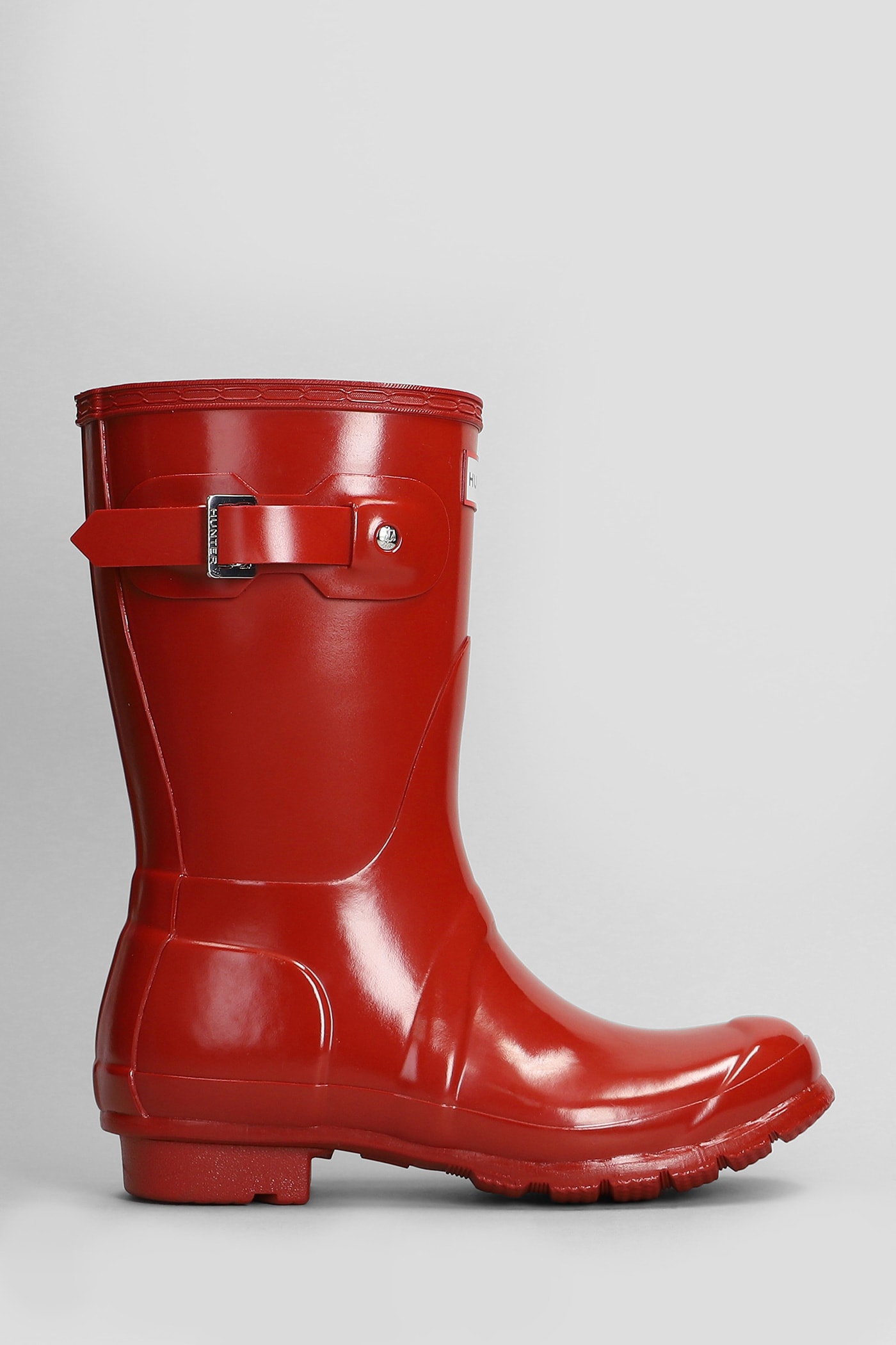 Shop Hunter Original Short Gloss Low Heels Boots In Red Rubber/plasic