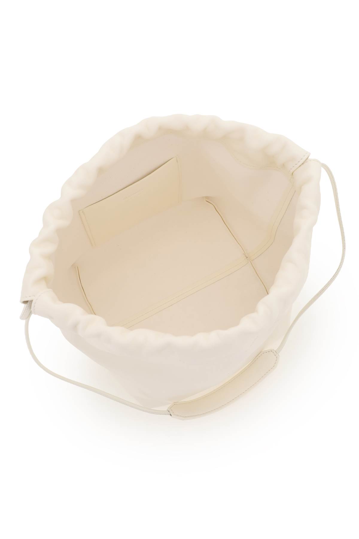 Shop Jil Sander Nappa Leather Bucket Bag In Eggshell (white)