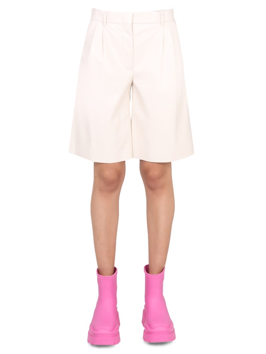 Shop Msgm Faux Leather Bermuda Shorts In Ivory