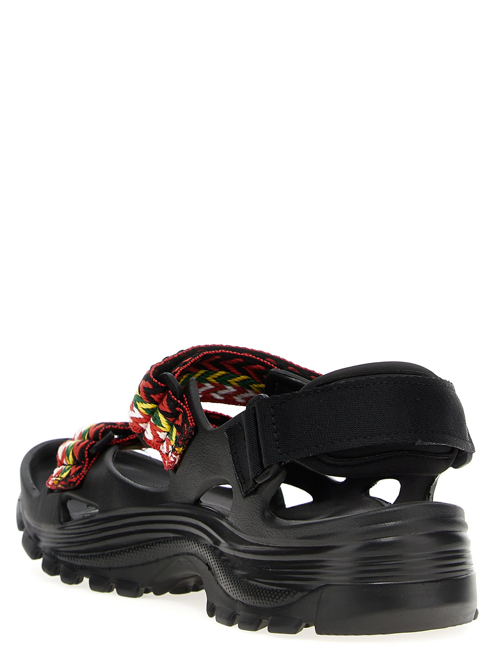 Shop Lanvin Wave Curb Sandals In Black