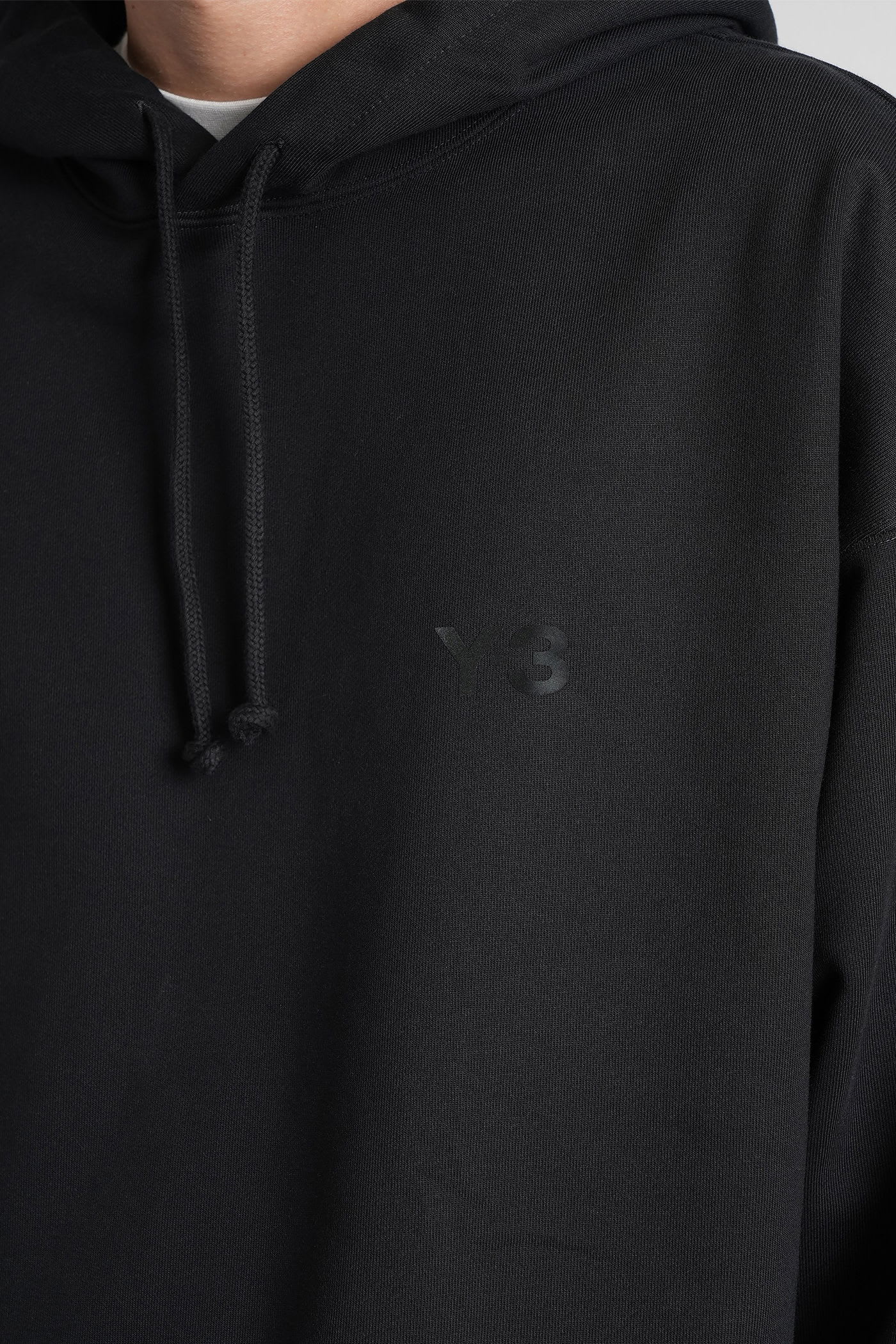 Y-3 Relaxed-fit Black Hoodie With Subtle Front Logo And Side Pockets In Black
