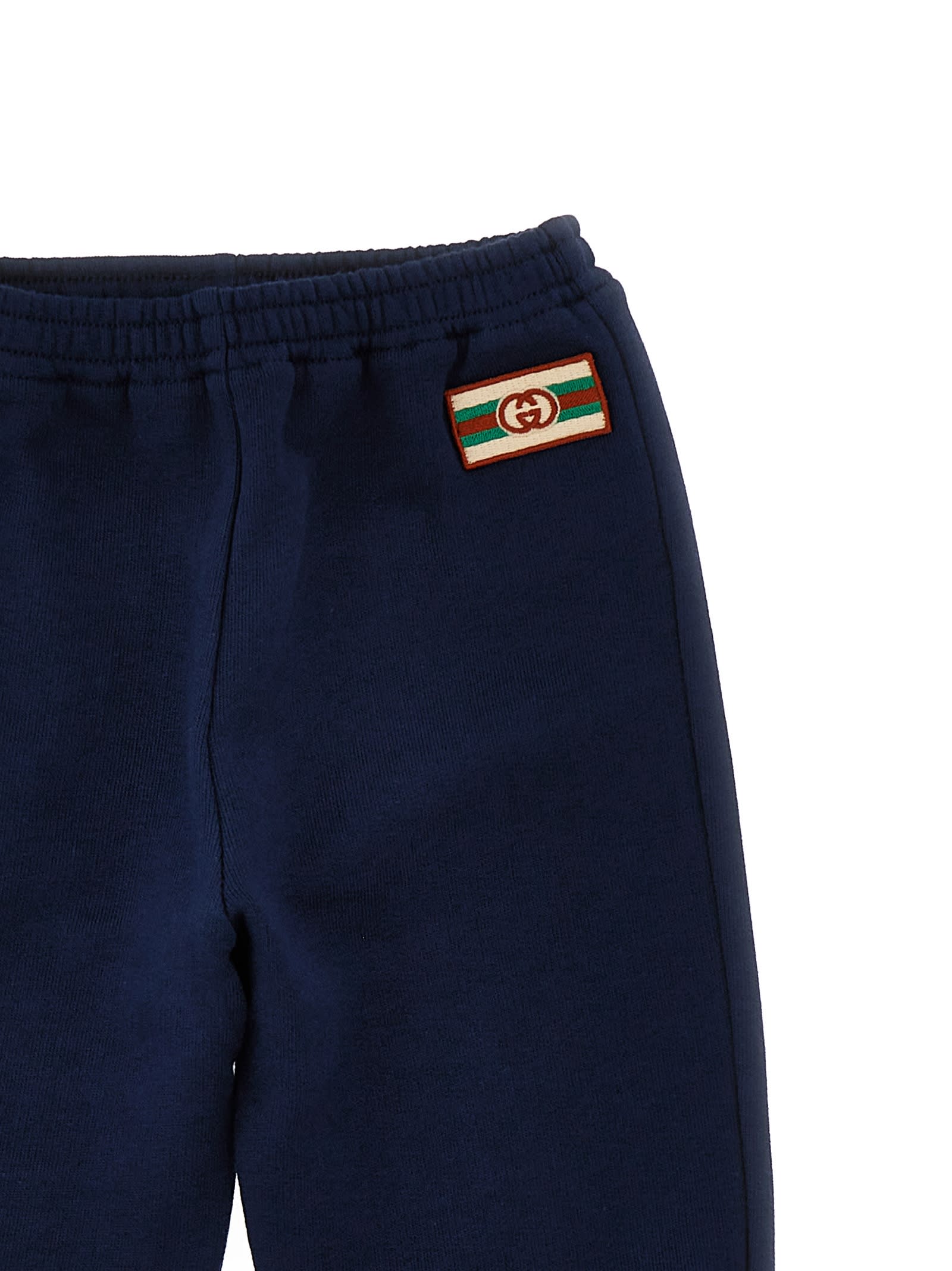 Shop Gucci Logo Embroidered Joggers In Navy