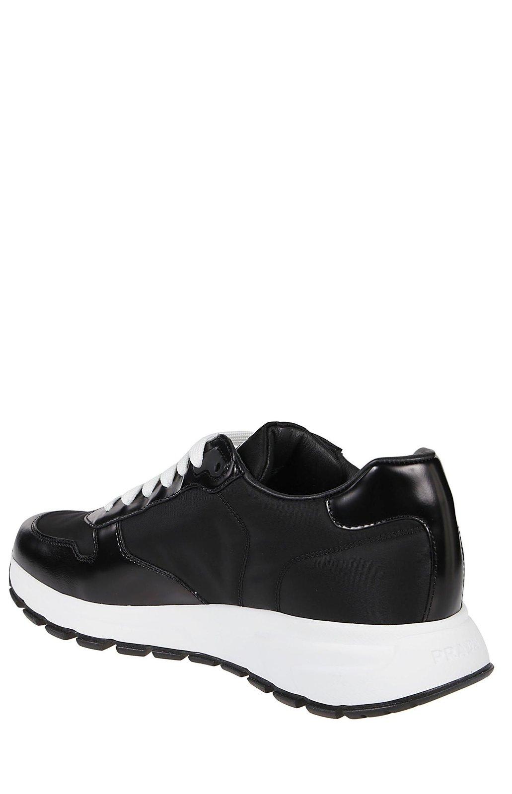 Shop Prada Triangle Logo Lace-up Sneakers In Nero