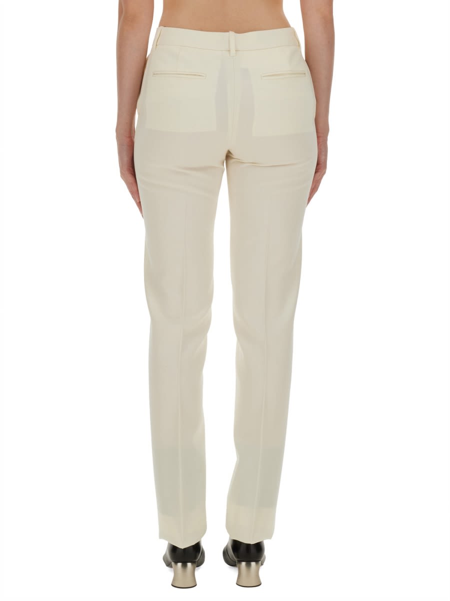 Shop Jil Sander Wool Pants In Powder