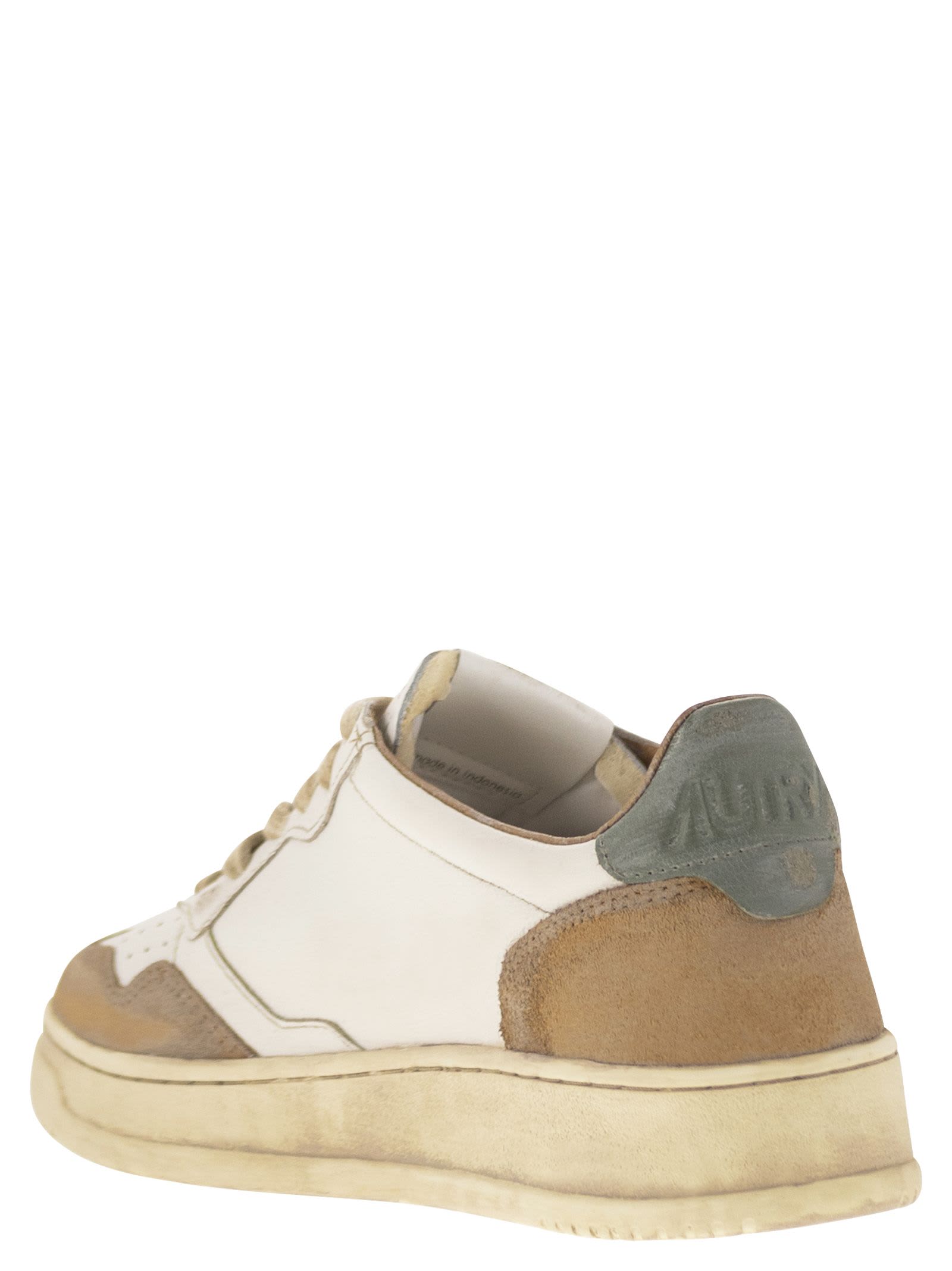 Shop Autry Super Vintage - Leather Sneakers In White/beige