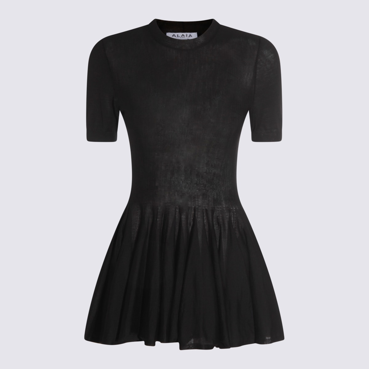 Alaïa Ultra Fine Wool Merino Peplum Top Clothing In Black