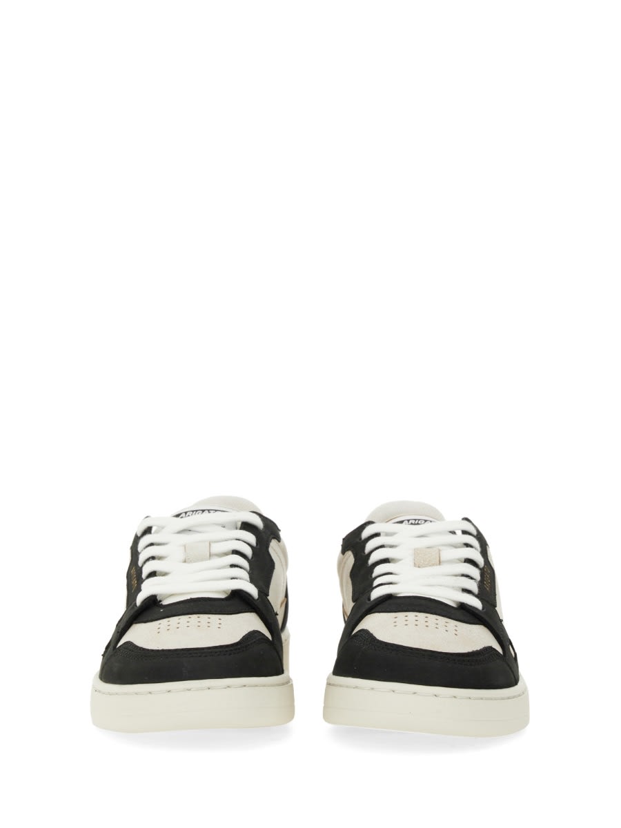 Shop Axel Arigato Sneaker Says It In White