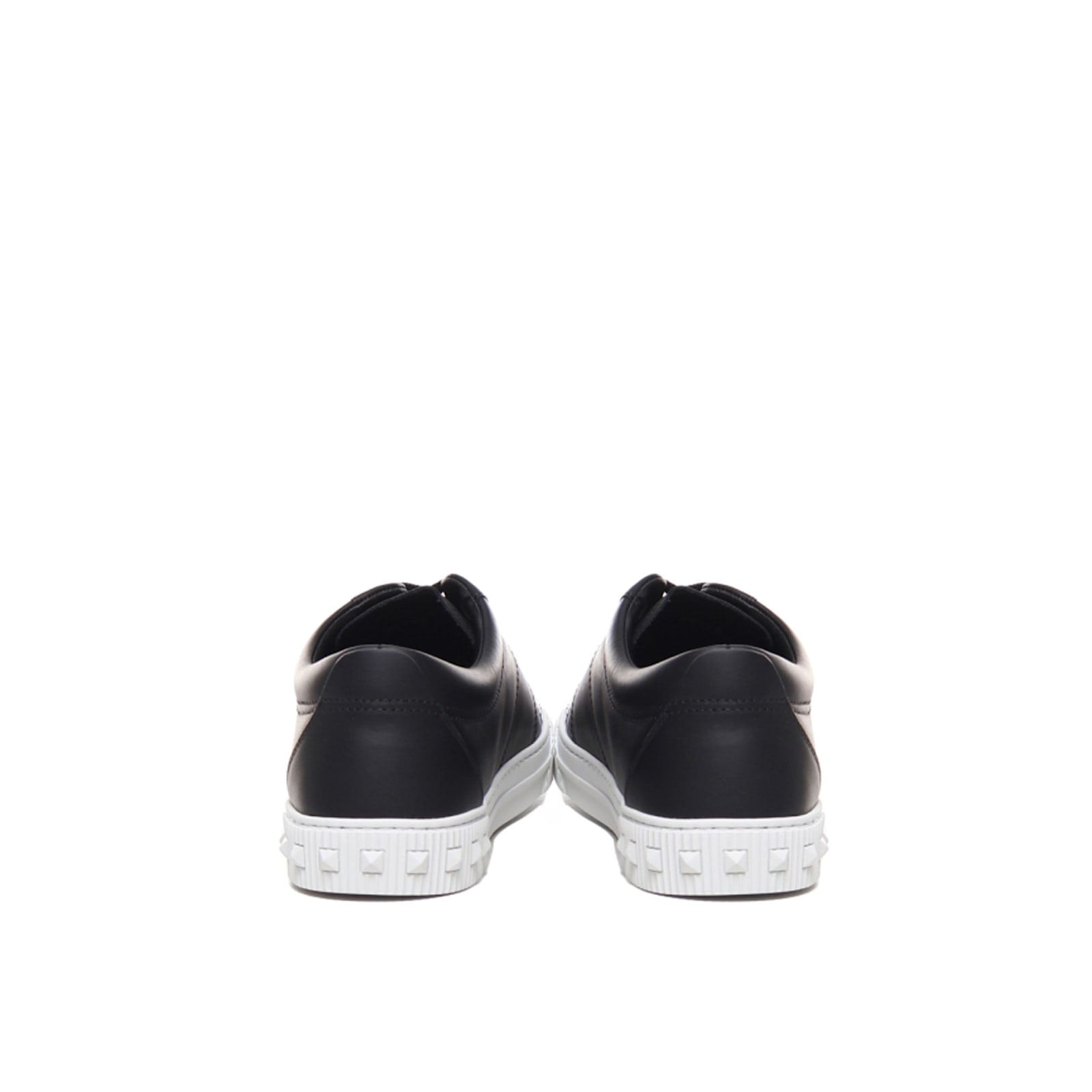 Shop Valentino Garavani Leather Sneakers In Black