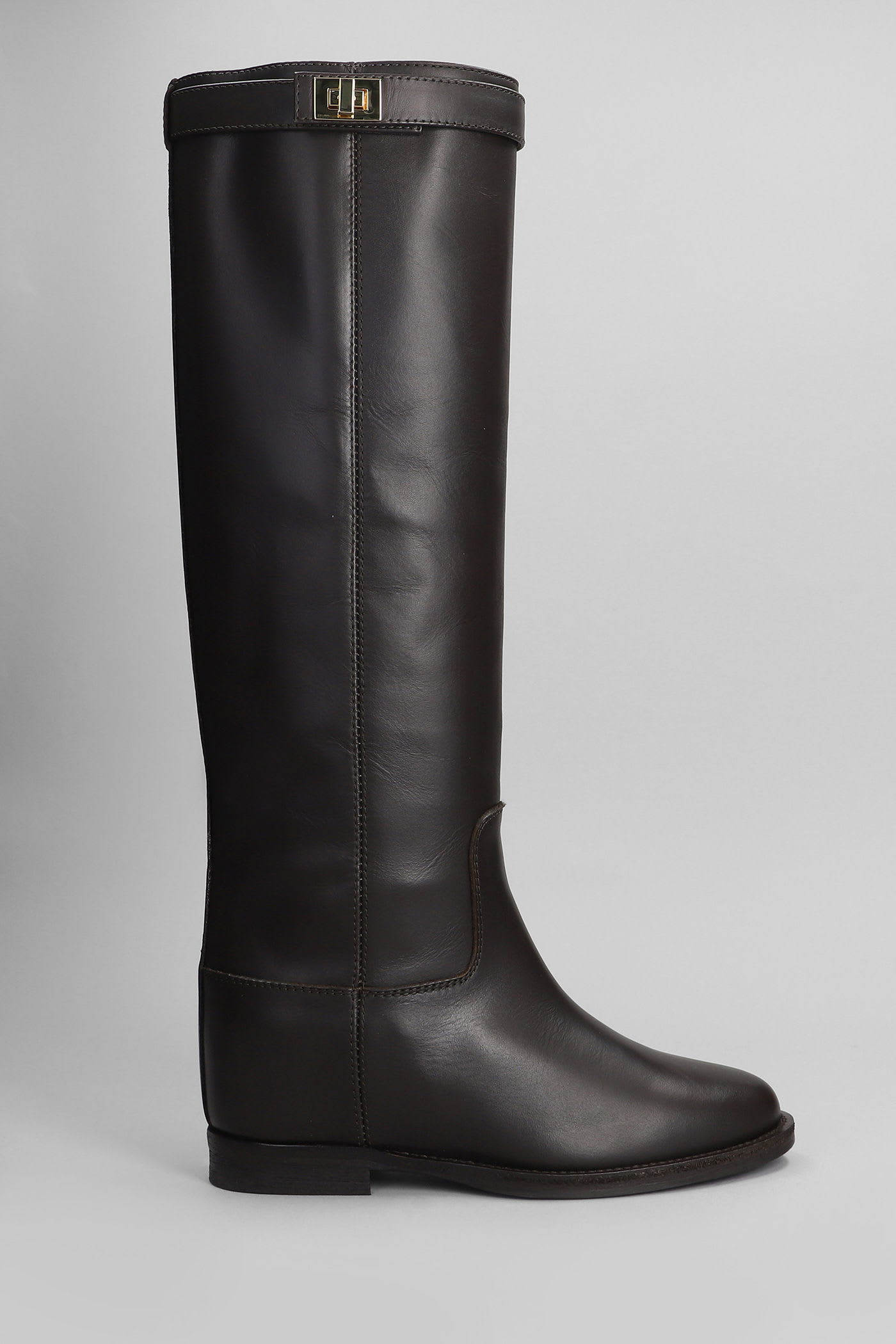In Dark Brown Leather