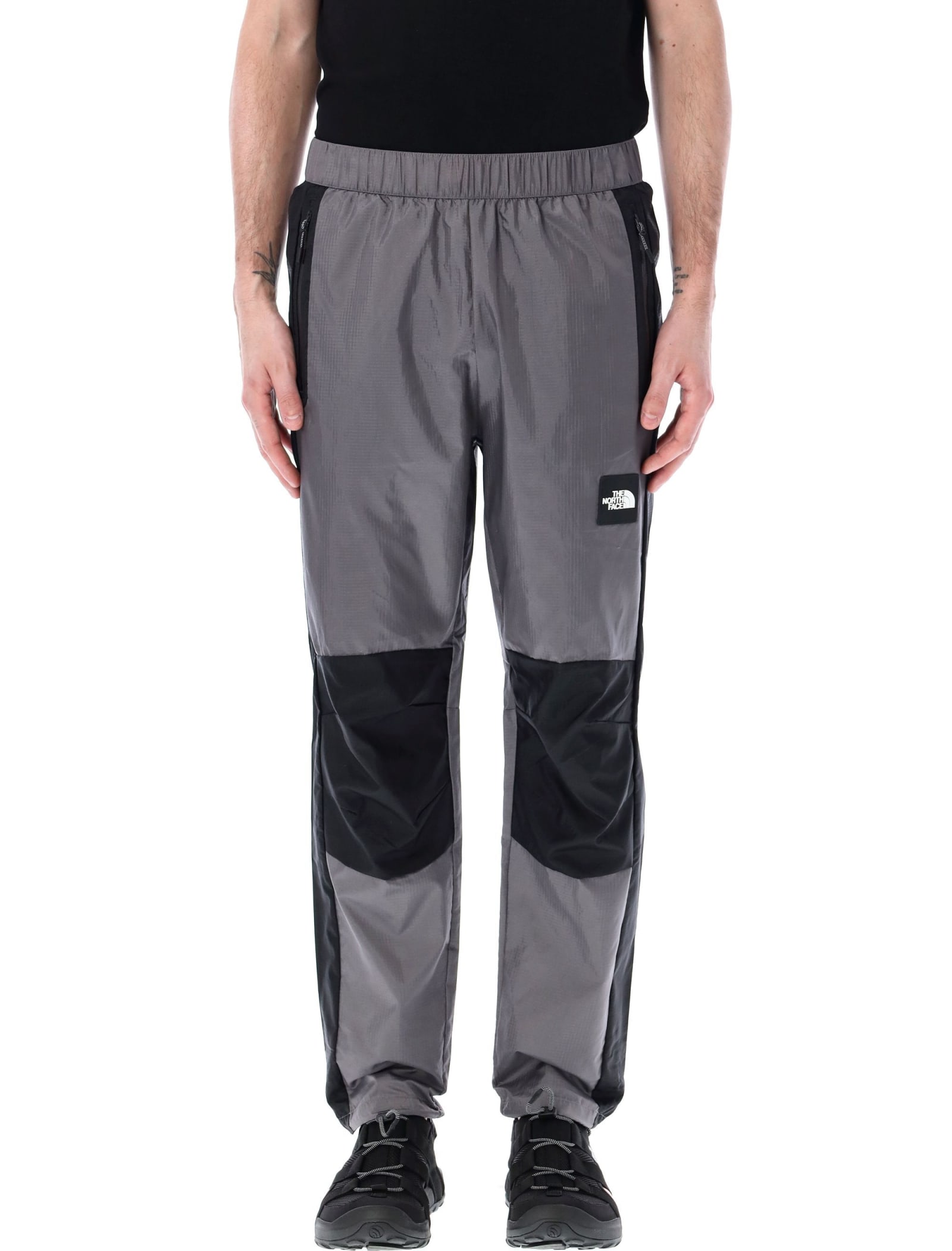 Shop The North Face Wind Shell Trousers In Grey