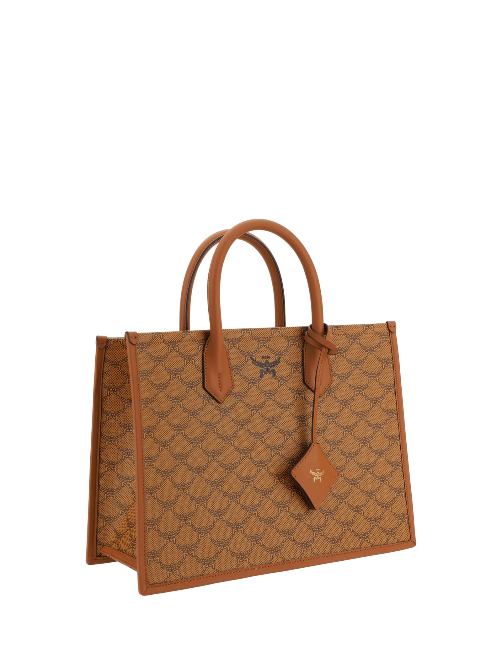 Shop Mcm Handbag In Cognac