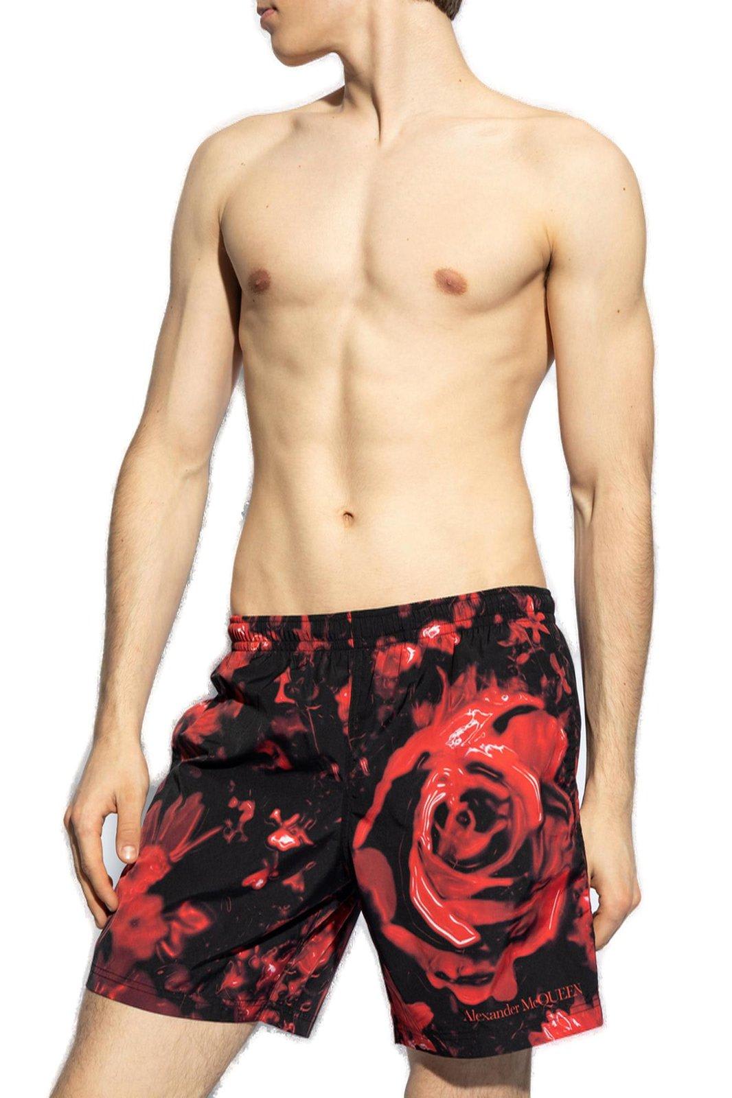 Shop Alexander Mcqueen All-over Printed Swim Shorts In Black/red