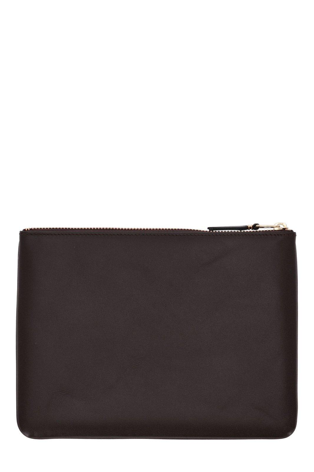 Shop Comme Des Garçons Logo Detailed Zipped Wallet In Brown