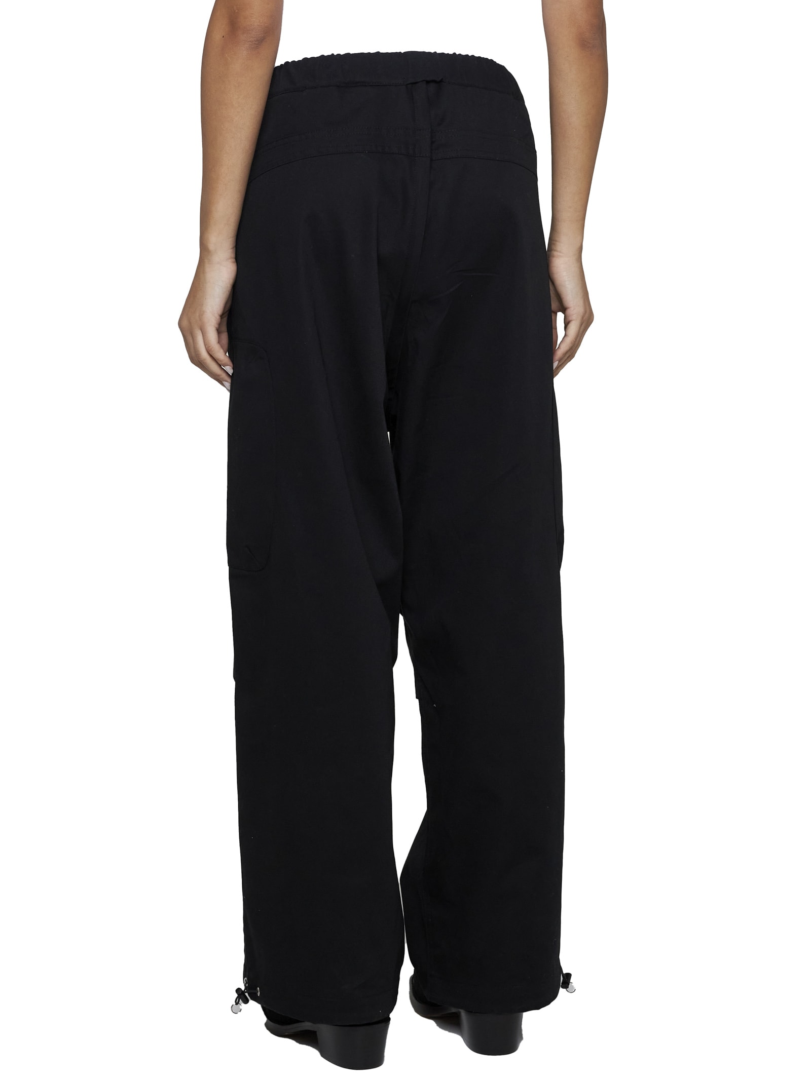 Shop Random Identities Pants In Black