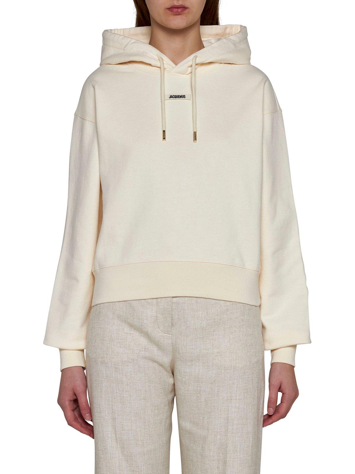 Shop Jacquemus Logo Patch Drawstring Hoodie In Beige