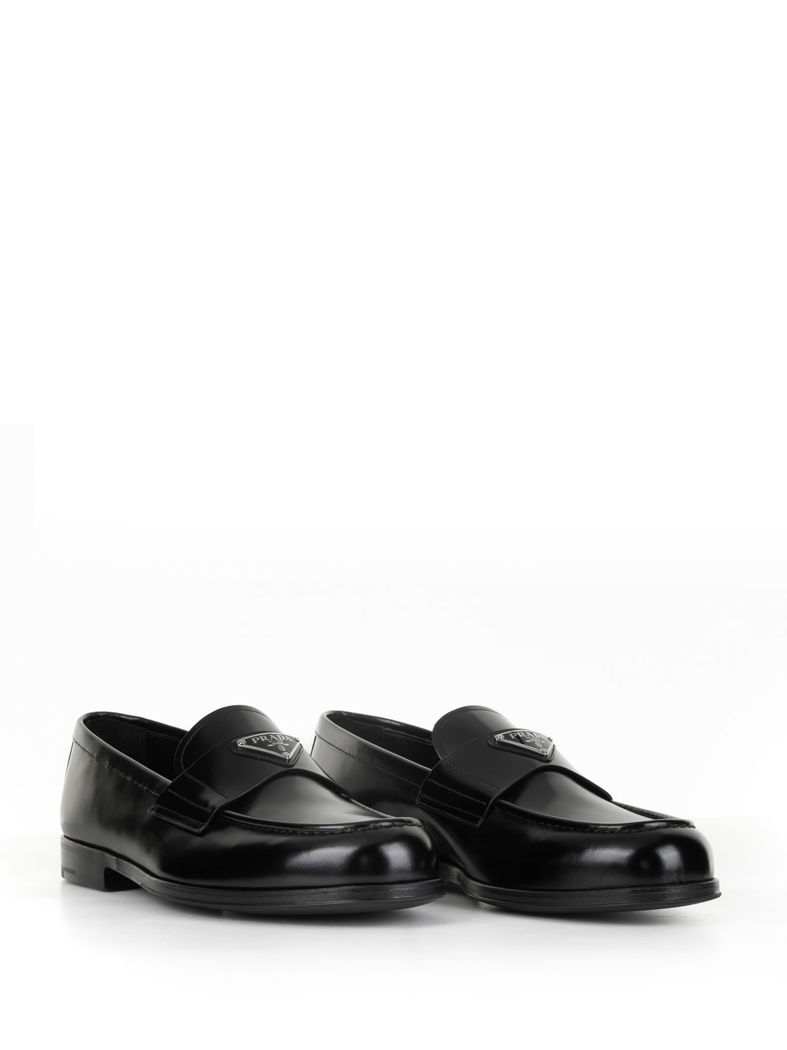 Shop Prada Brushed Leather Loafers With Logo In Nero