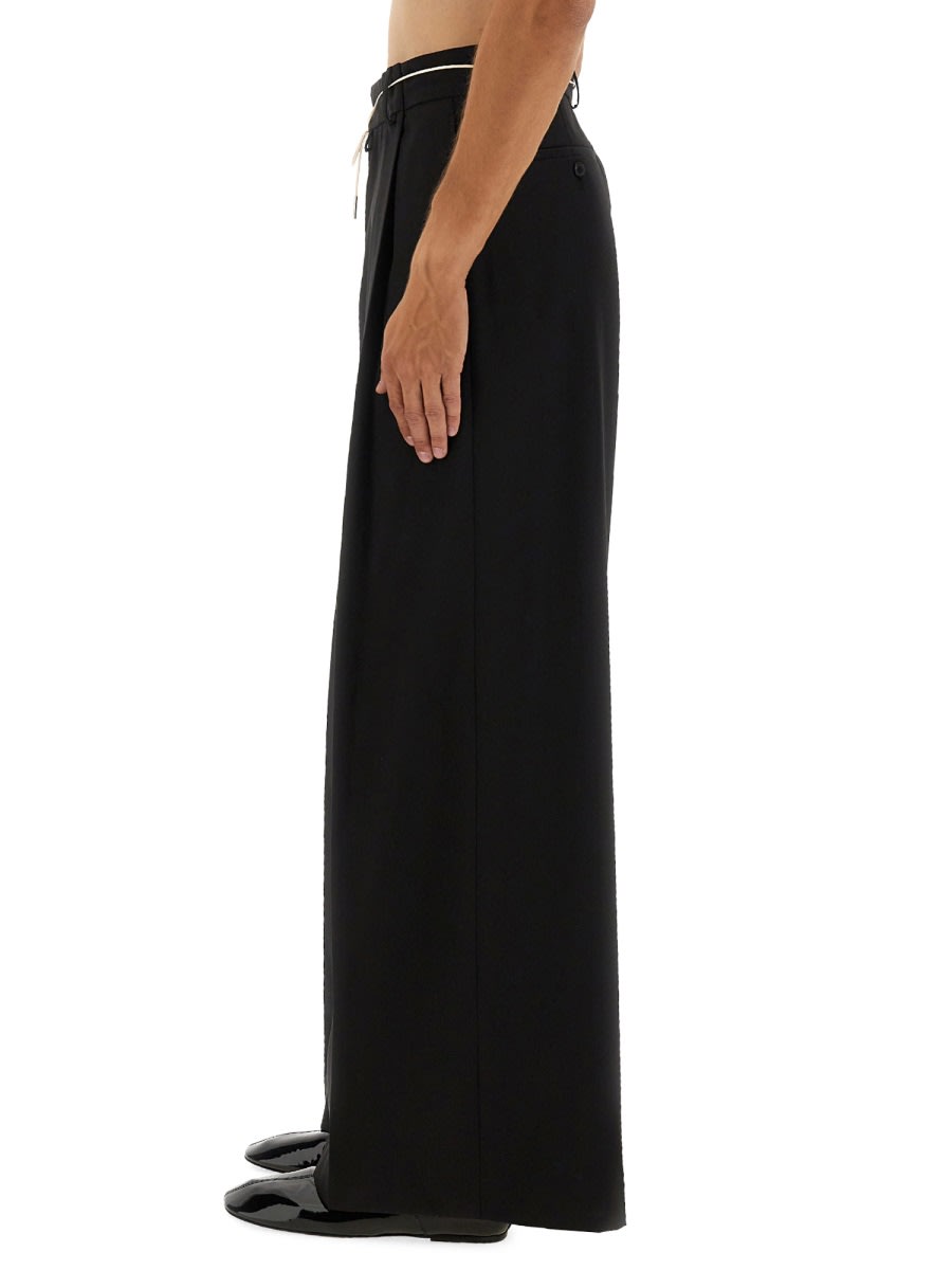 Dries Van Noten Wide-leg Trousers Featuring Pleated Front In Black