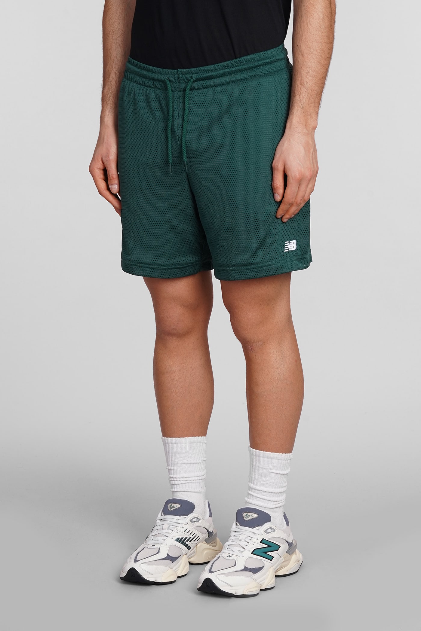NEW BALANCE SHORTS IN GREEN POLYESTER