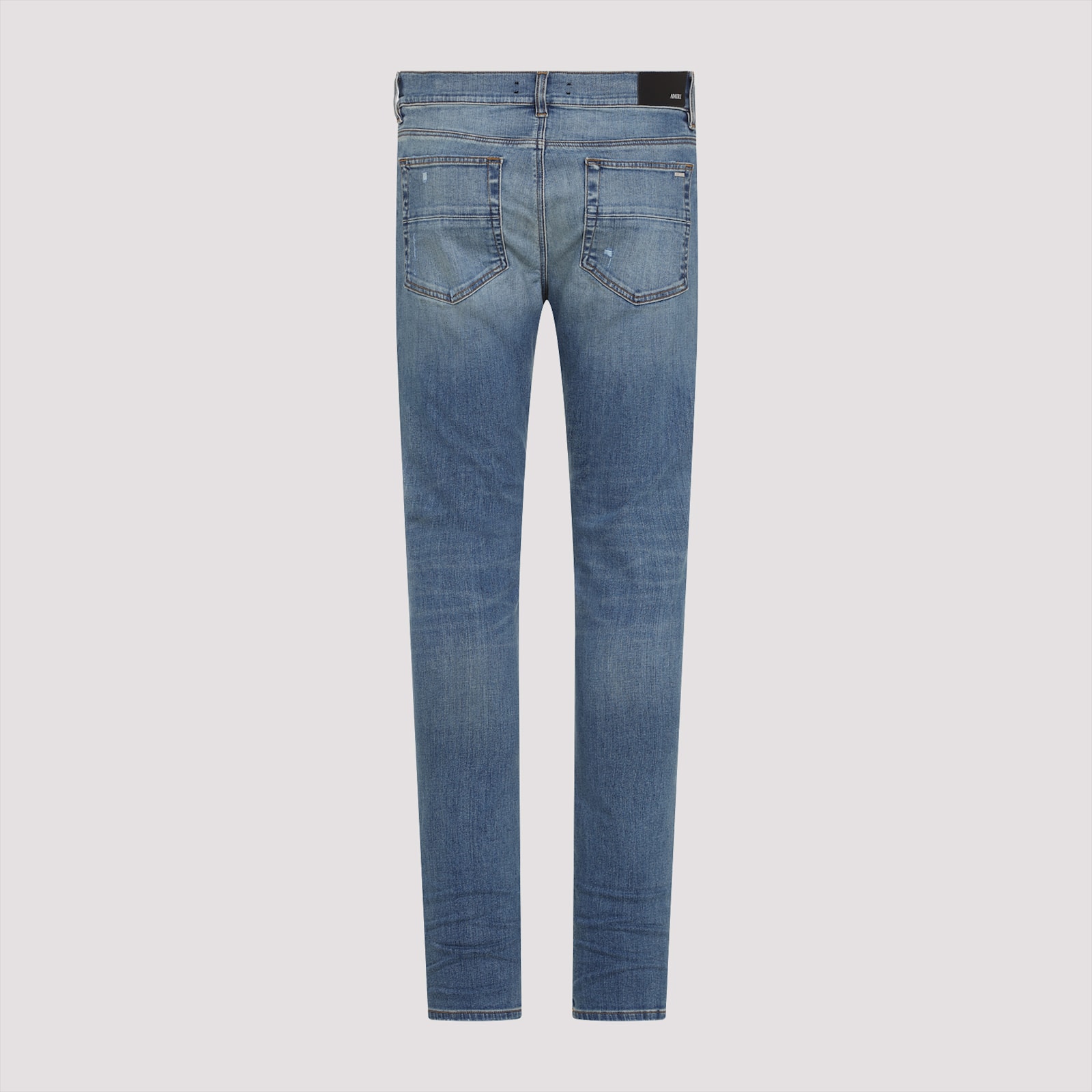 Amiri Stack Low-rise Jeans In Blue