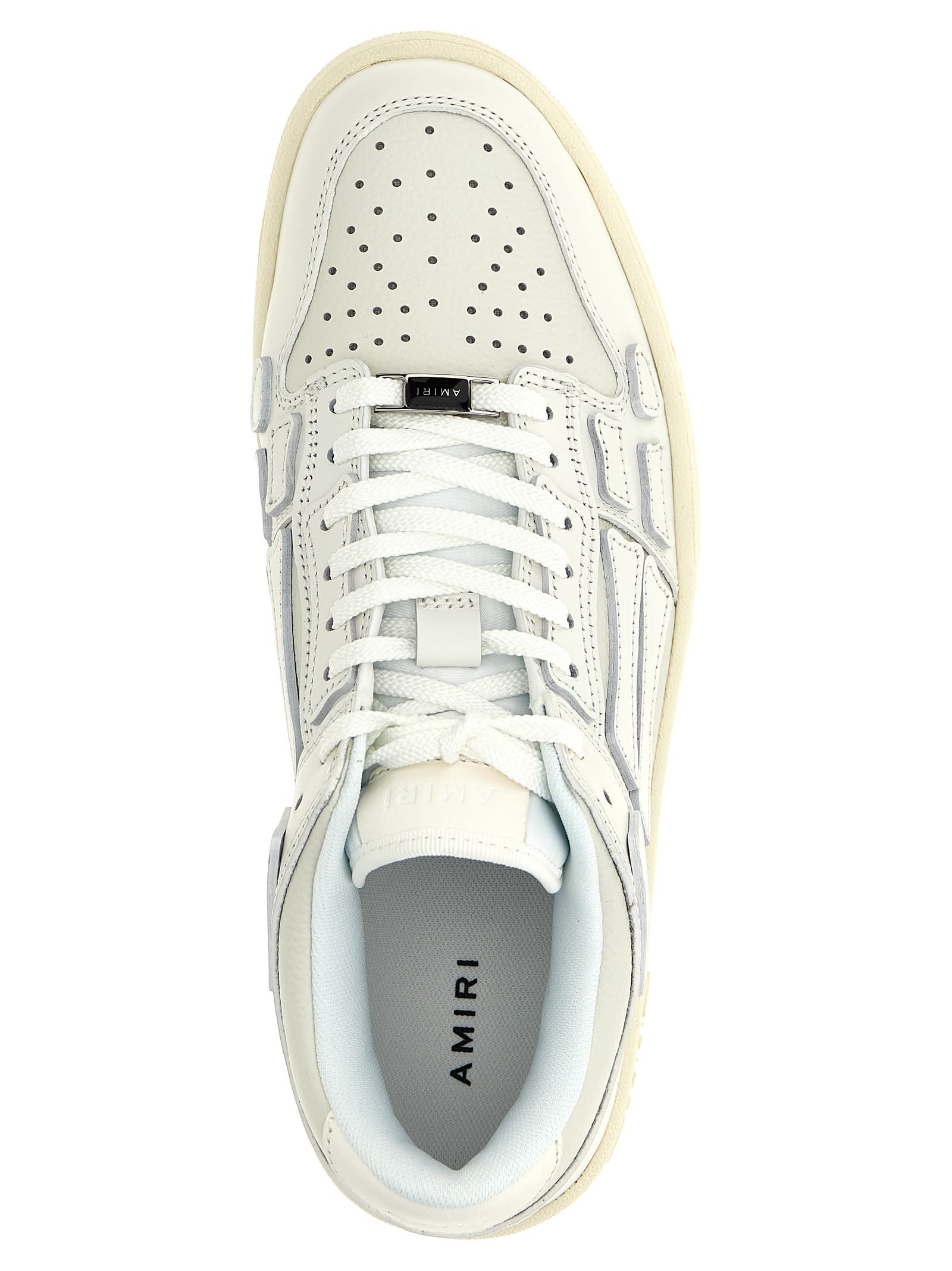 Shop Amiri Skel Top Low Sneakers In White