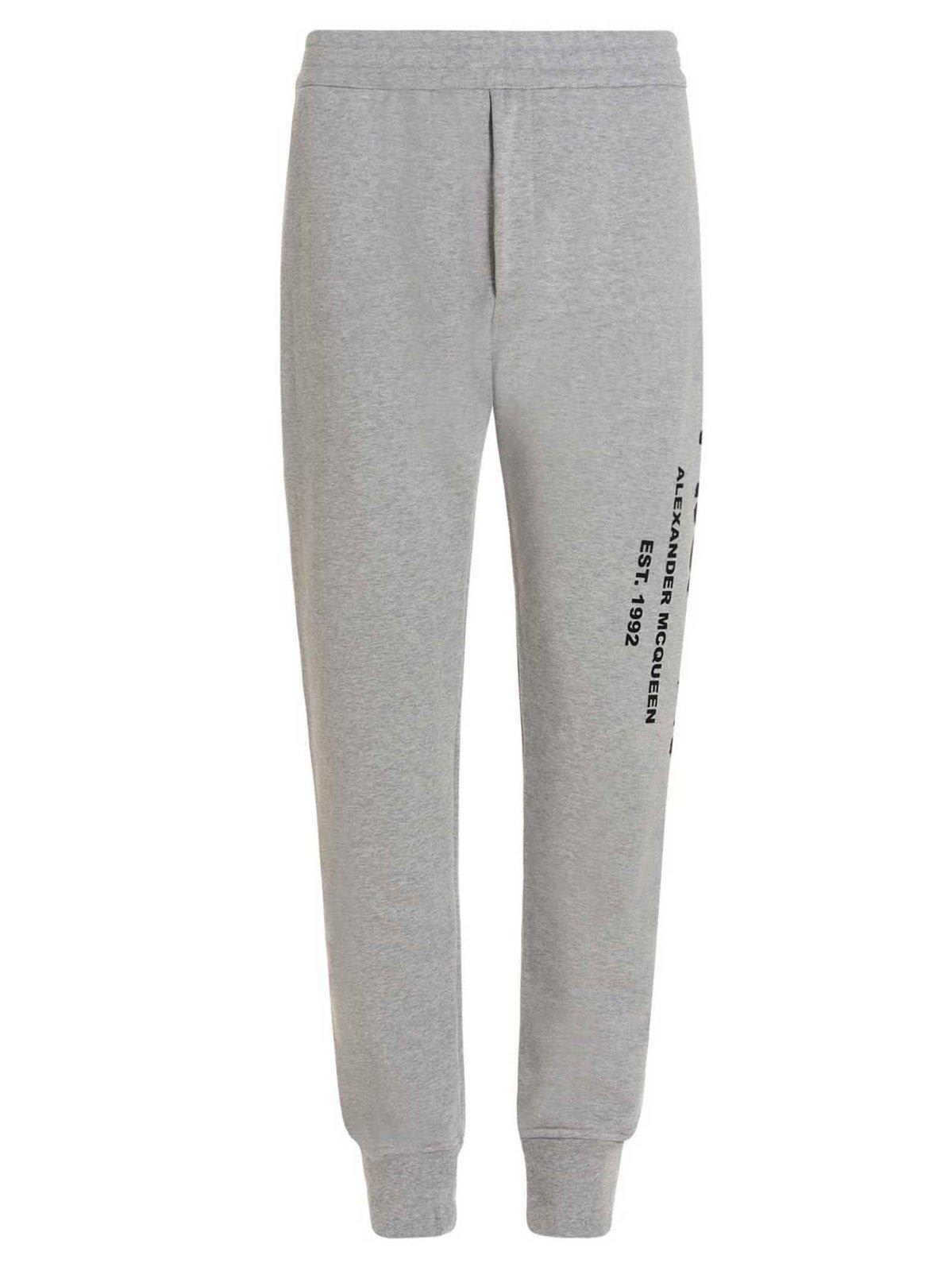 ALEXANDER MCQUEEN LOGO PRINTED SLIM CUT TRACK TROUSERS