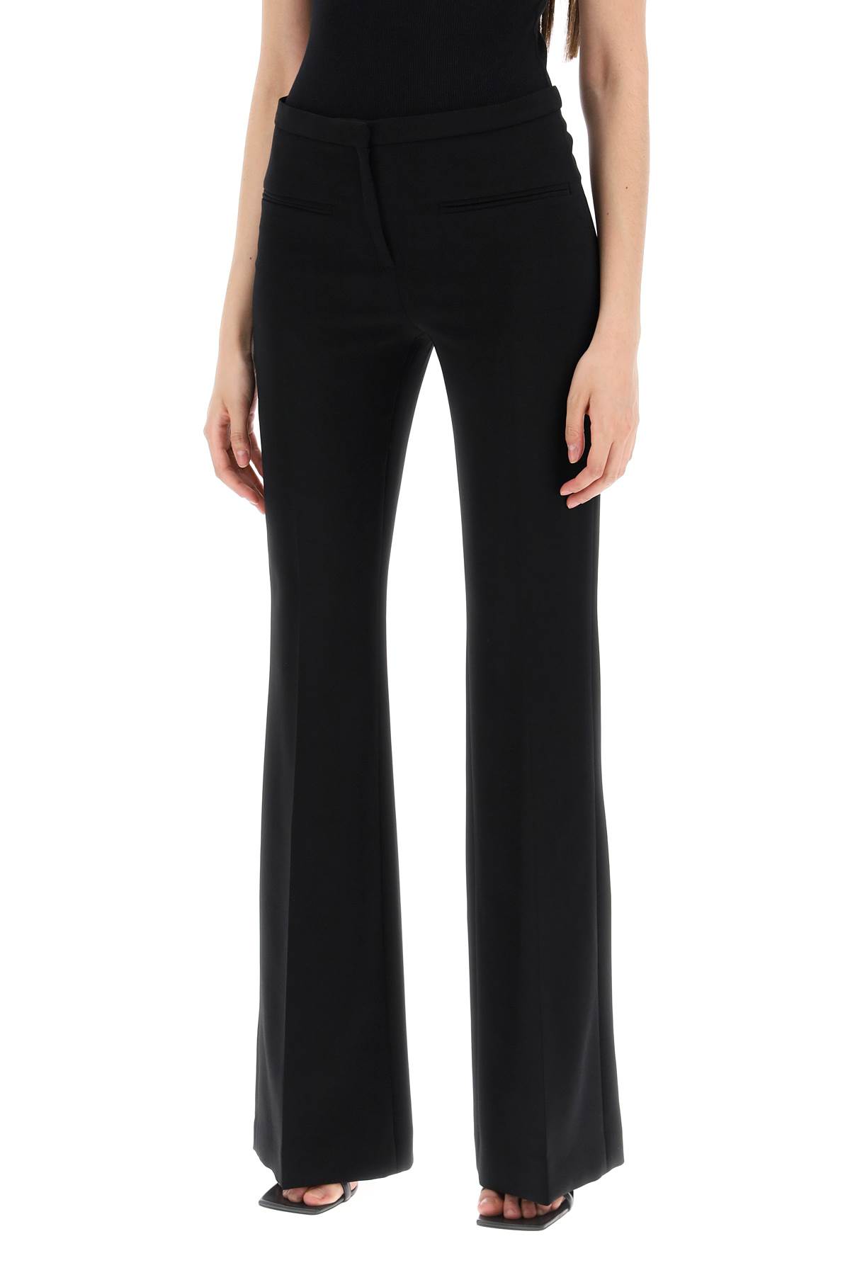 Shop Courrèges Tailored Bootcut Pants In Technical Jersey In Black (black)