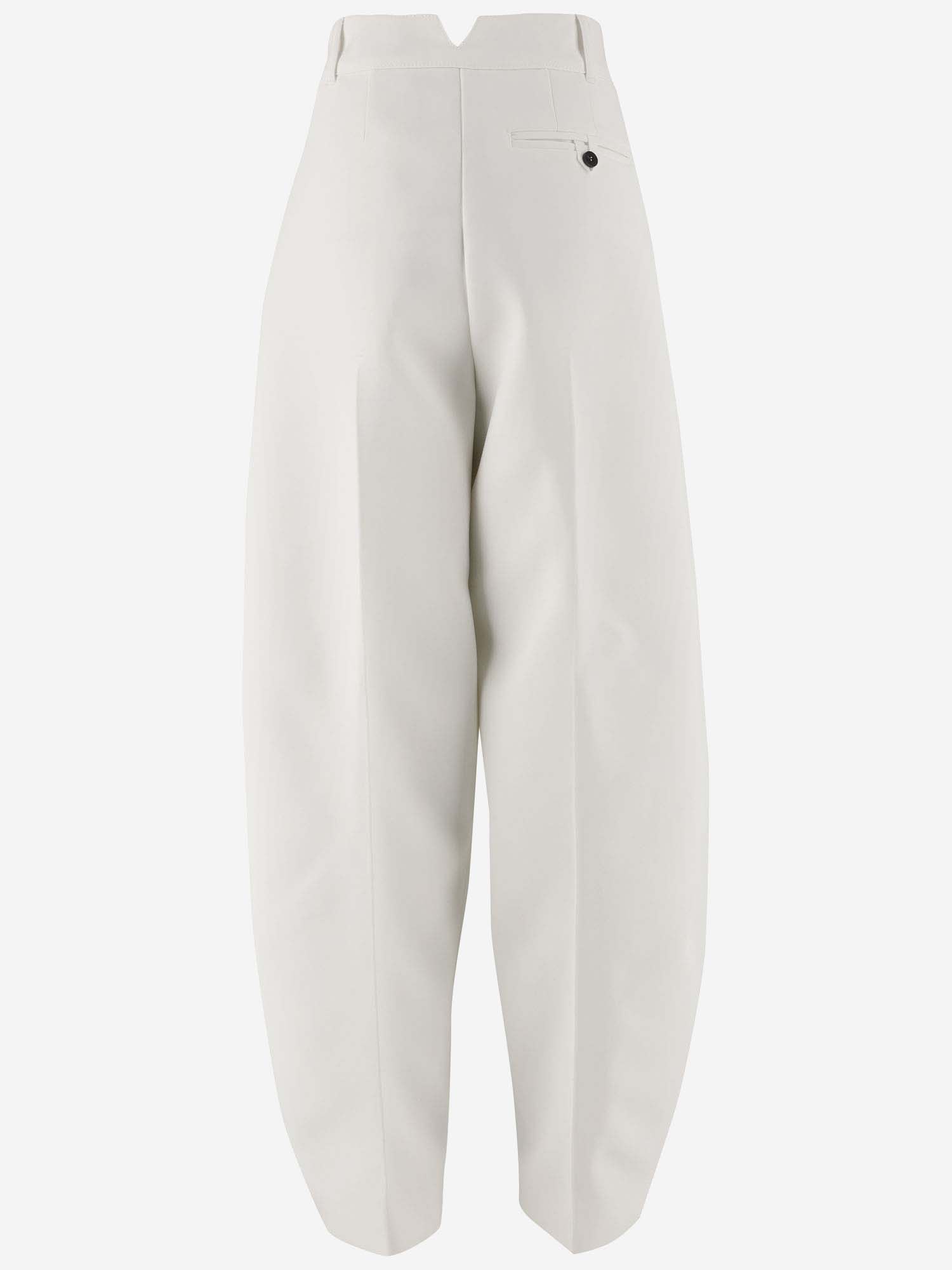 Shop Jacquemus The Oval Trousers In White