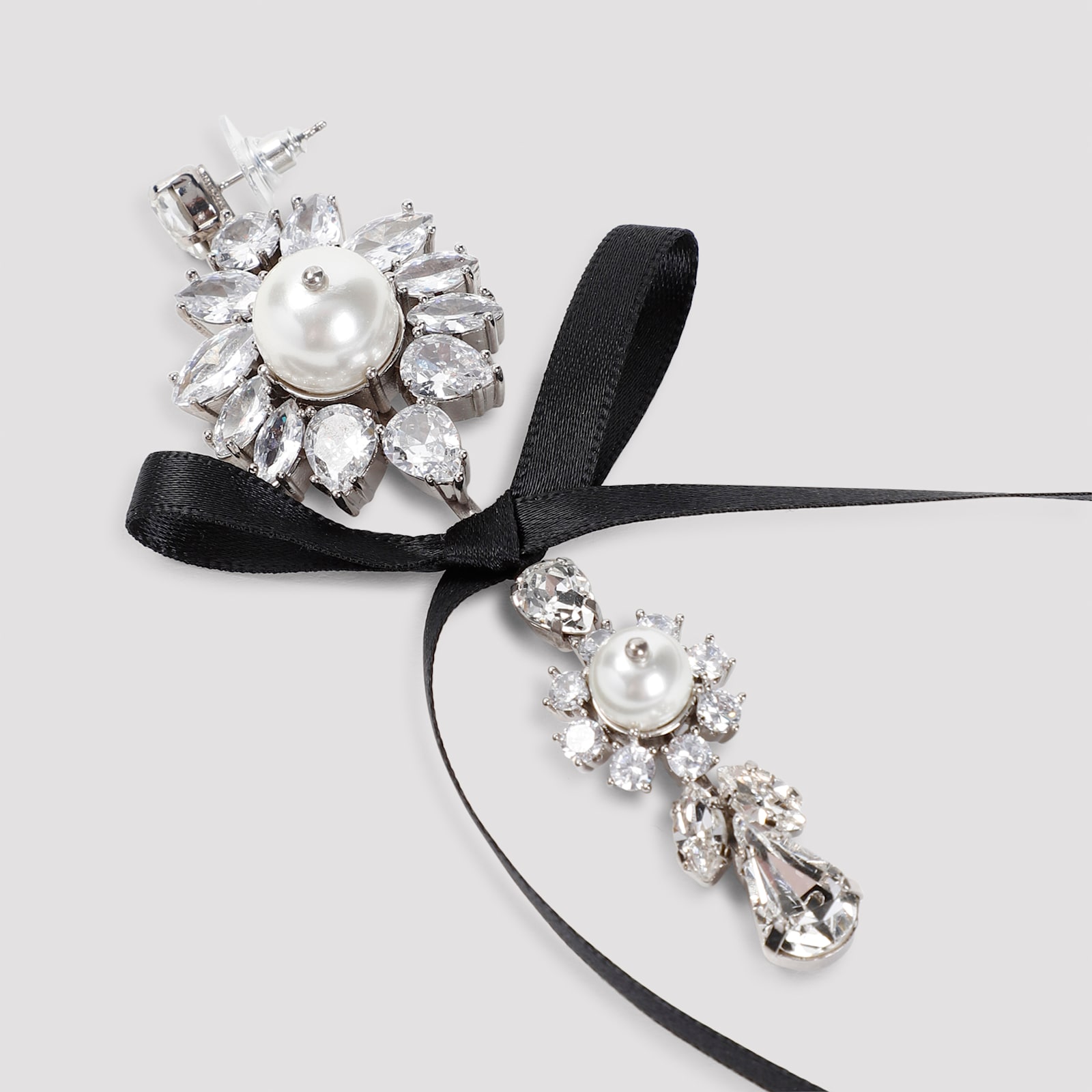 Shop Simone Rocha Long Crystal Crest Bow Earrings In Silver/black