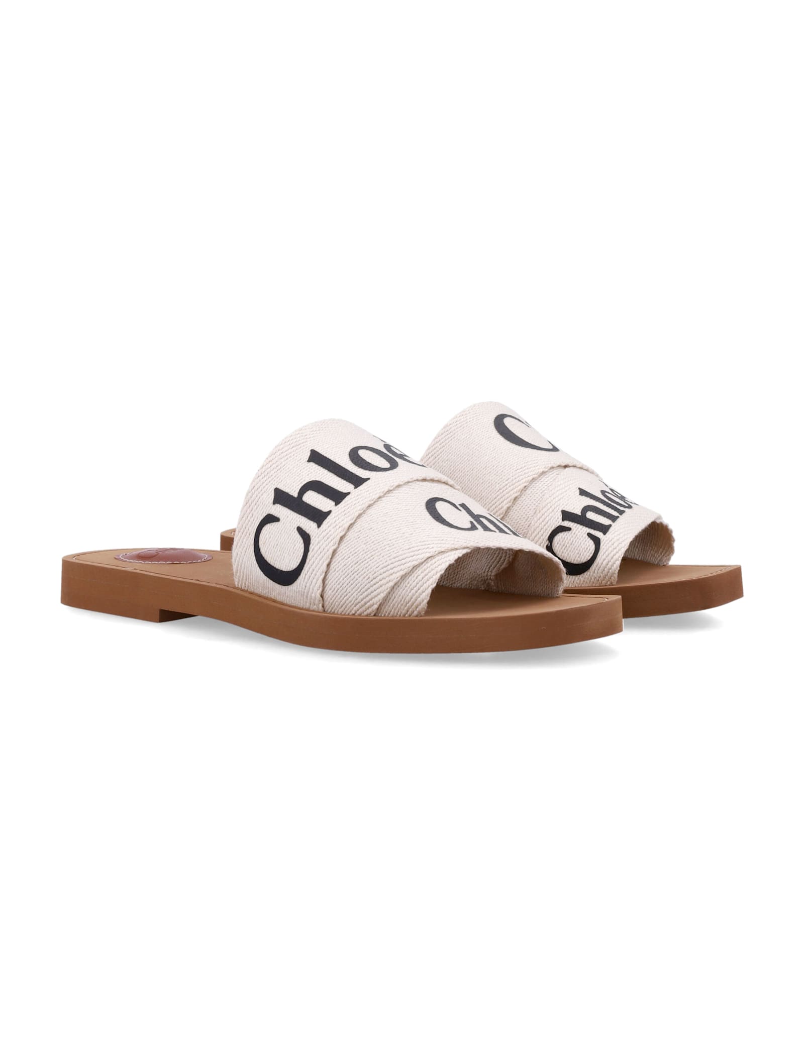 Shop Chloé Woody Slides Sandals In White