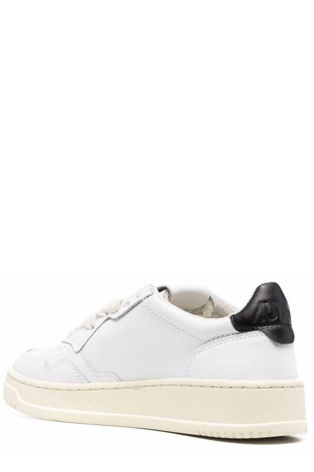 Shop Autry Logo Patch Low-top Sneakers In White Black