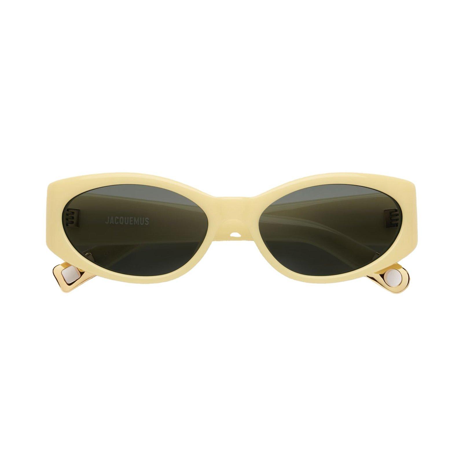 Shop Jacquemus Oval Frame Sunglasses In Ovalo Yellow Yellow Gold