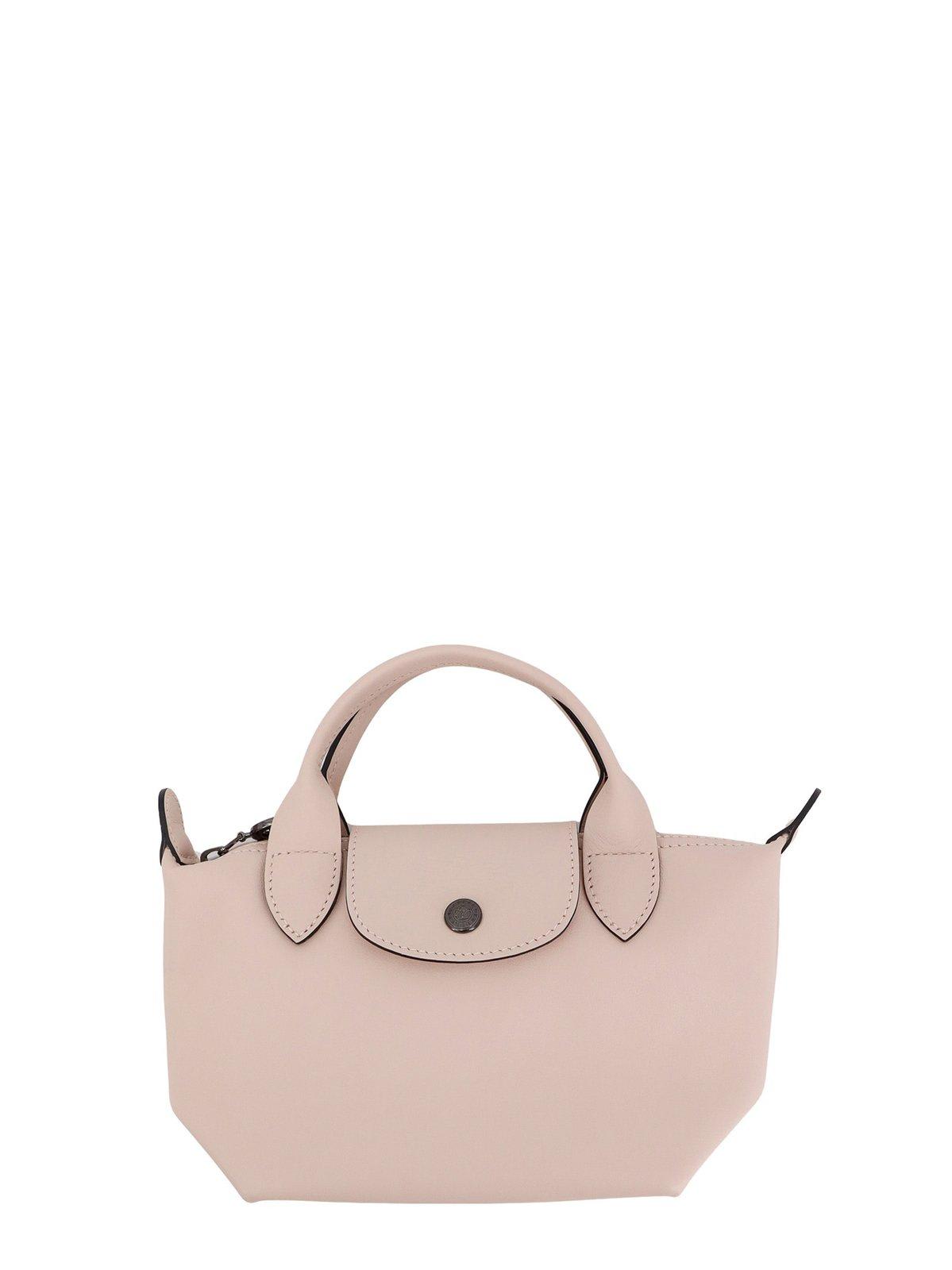 Shop Longchamp Le Pliage Xtra Xs Handbag