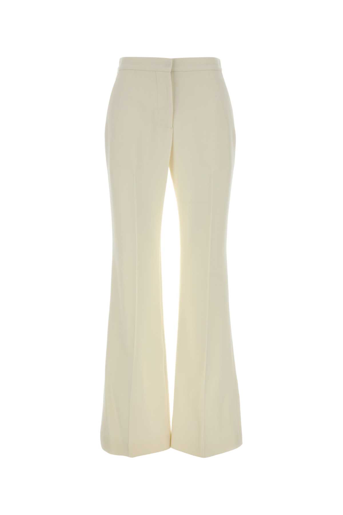 Givenchy Flared Wool Trousers Featuring Belt Loops In Neutral