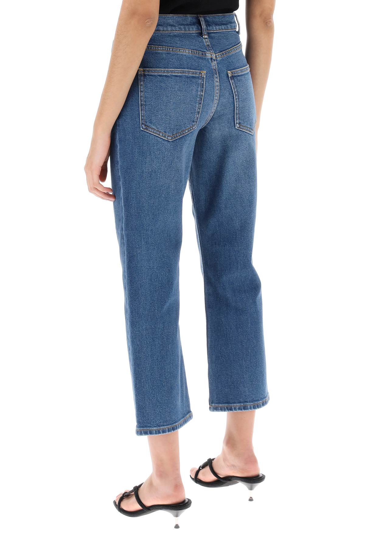 Shop Tory Burch Cropped Flared Jeans In Dark Vintage Wash (blue)