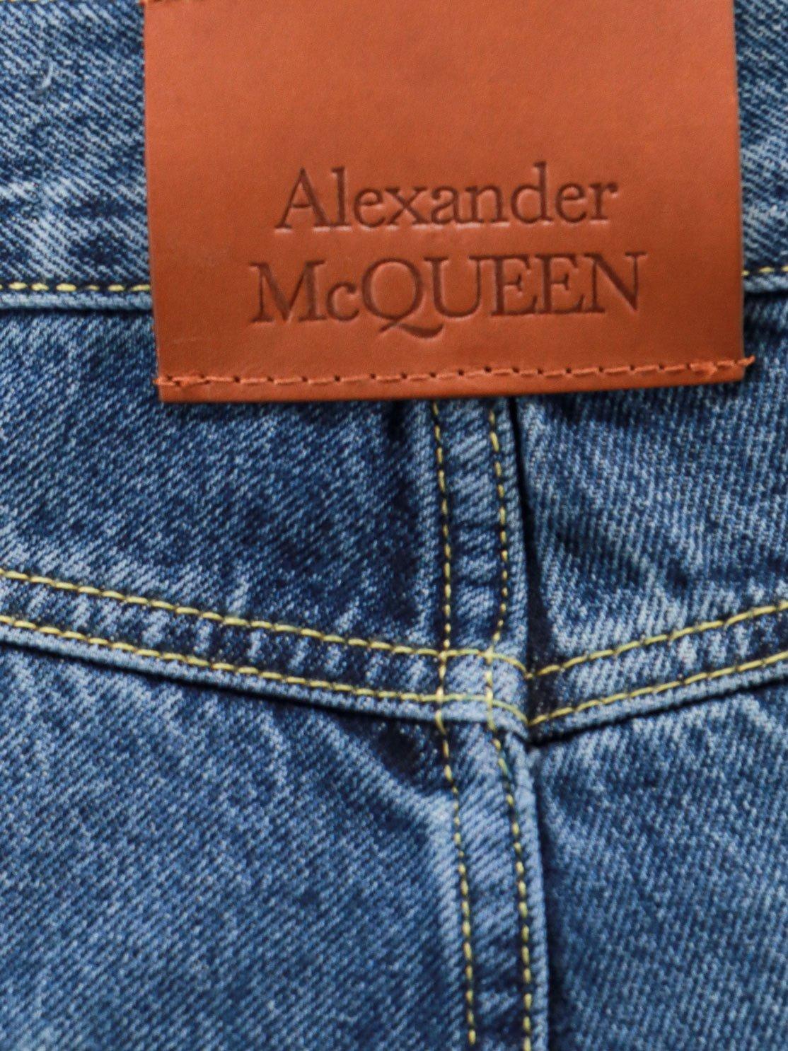 Shop Alexander Mcqueen Logo Patch Straight Leg Jeans In Azure