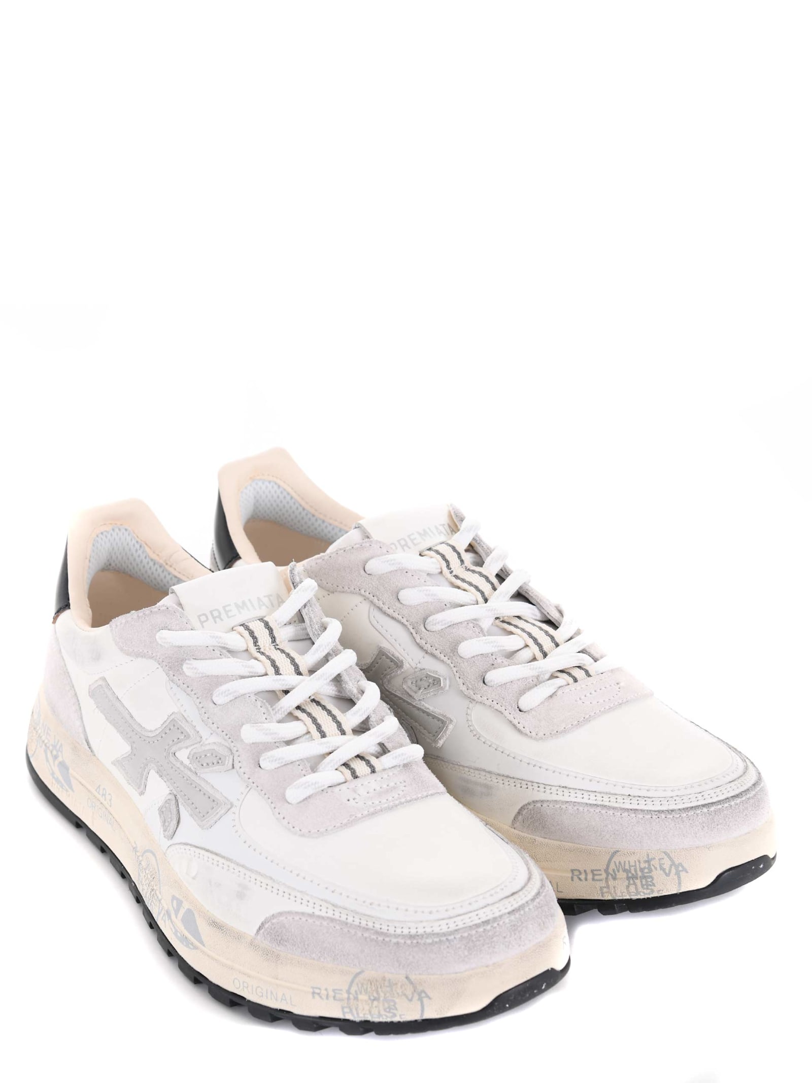 Shop Premiata Sneakers In White