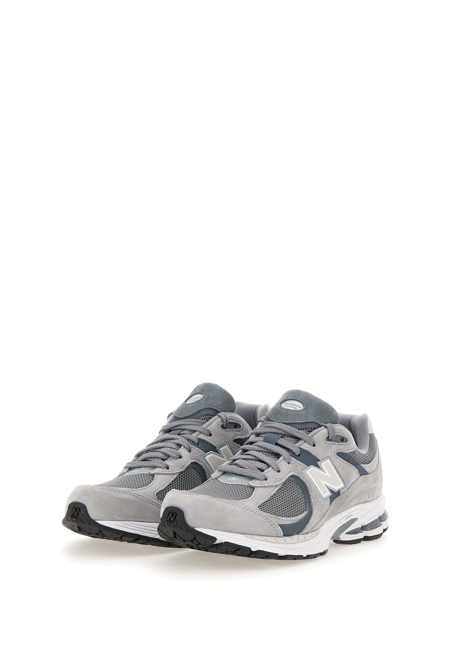 Shop New Balance M2002 Sneakers In Grey