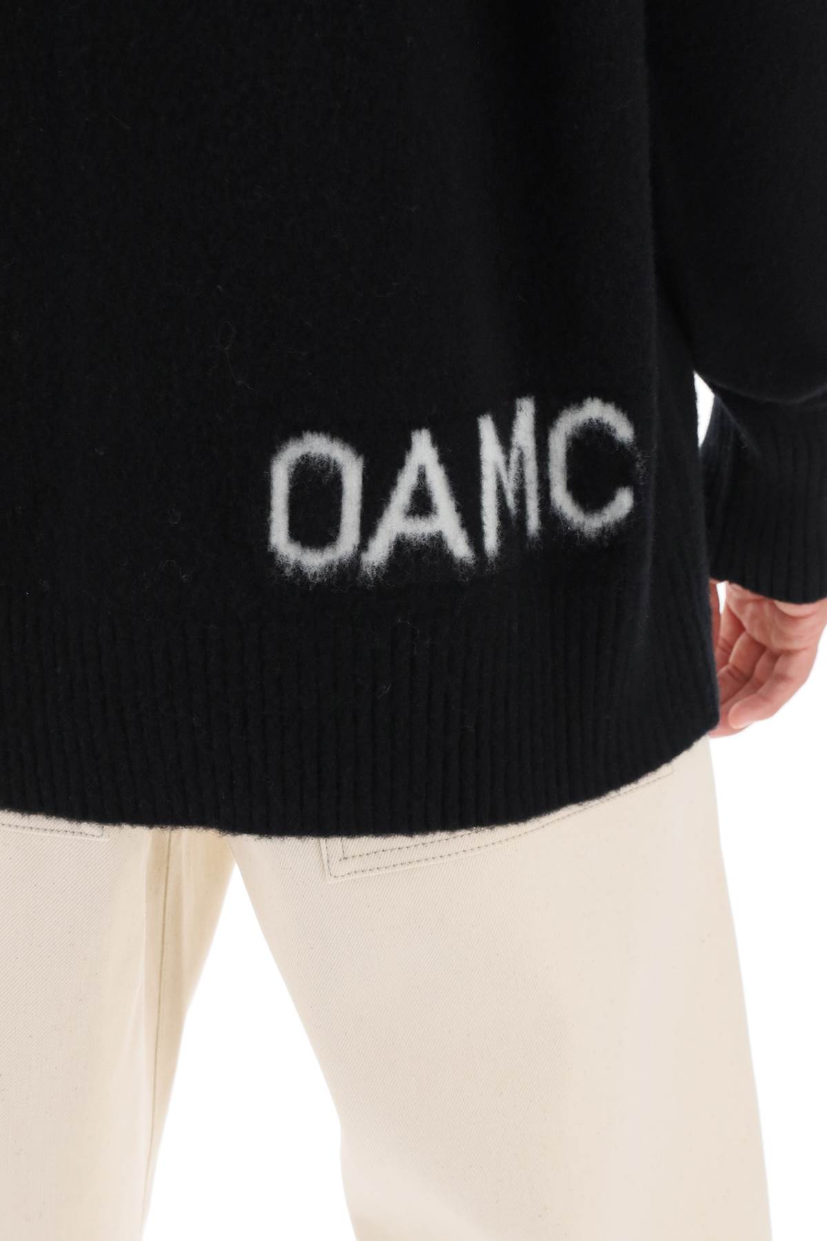 Shop Oamc Wool Sweater With Jacquard Logo In Black (black)