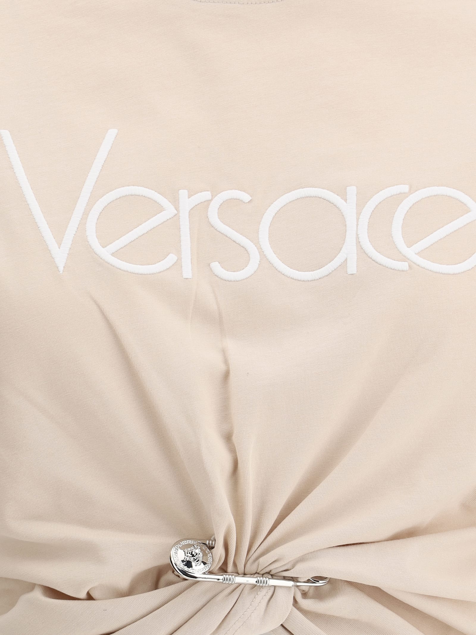 Versace Cropped T-shirt With Twist Detail And Safety Pin Logo In Champagne+white