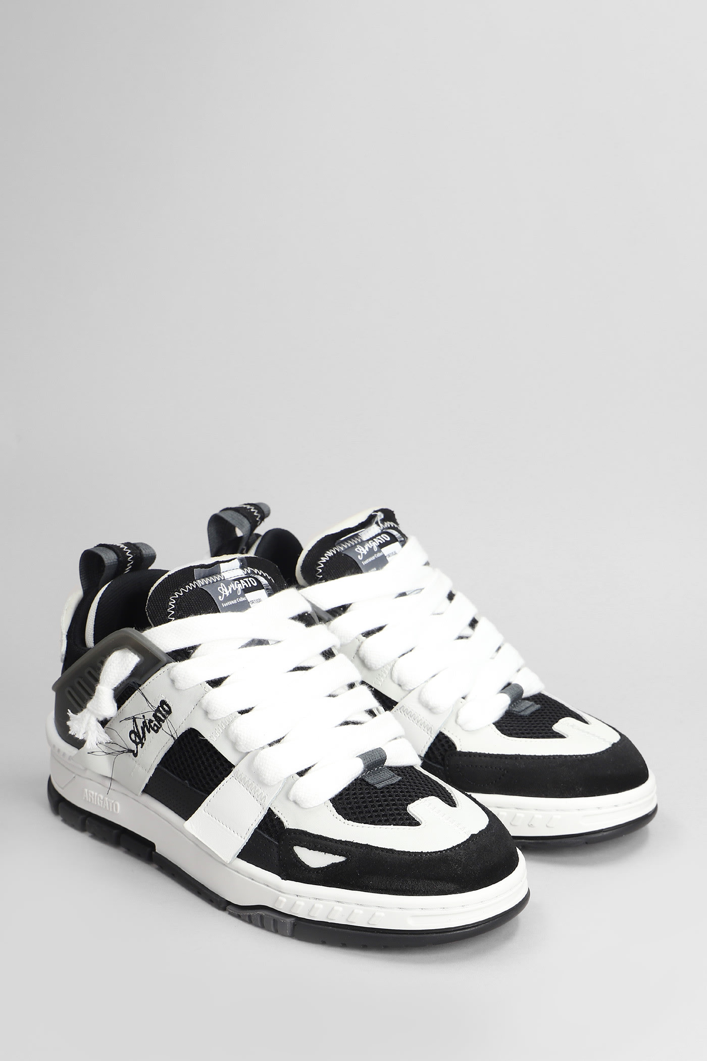 Shop Axel Arigato Area Patchwork Sneakers In Black Leather And Fabric