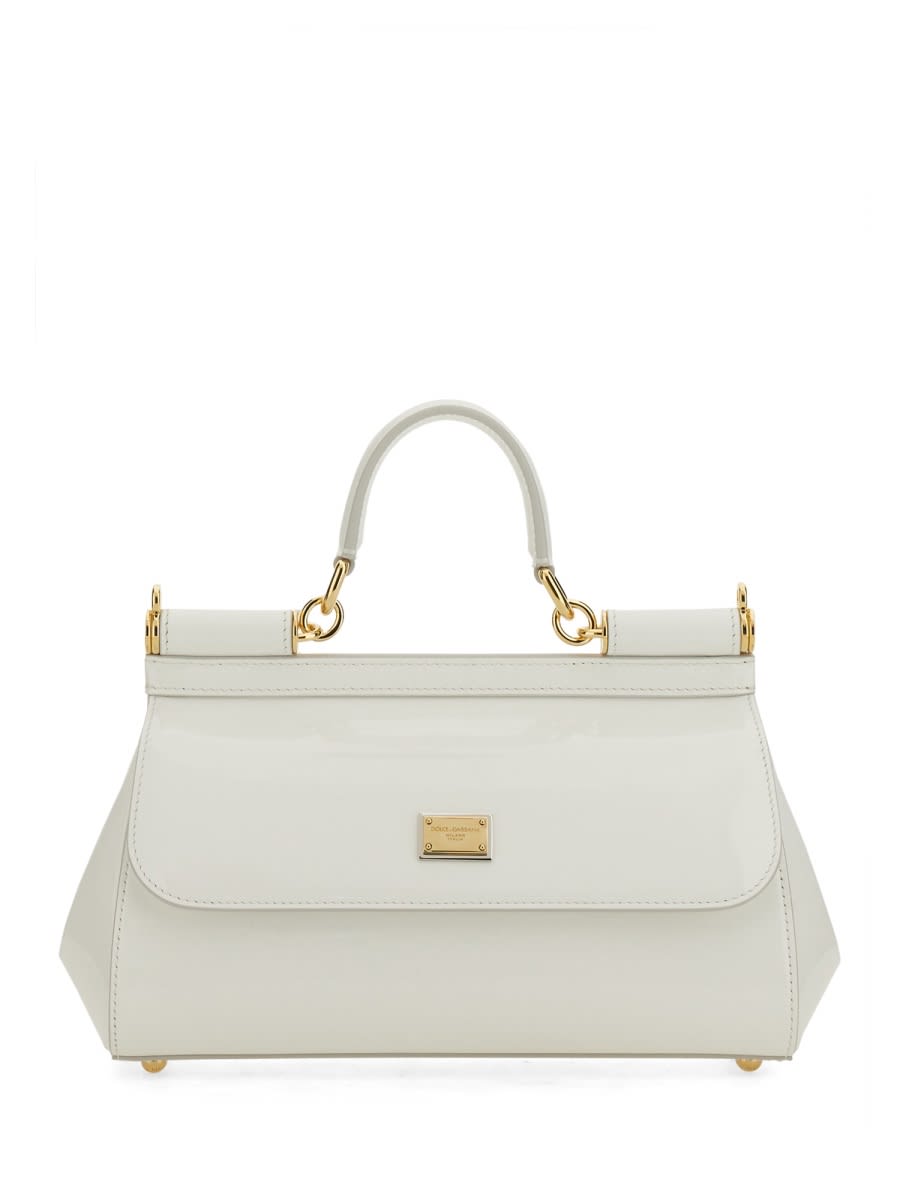 Shop Dolce & Gabbana Elongated Sicily Handbag In White