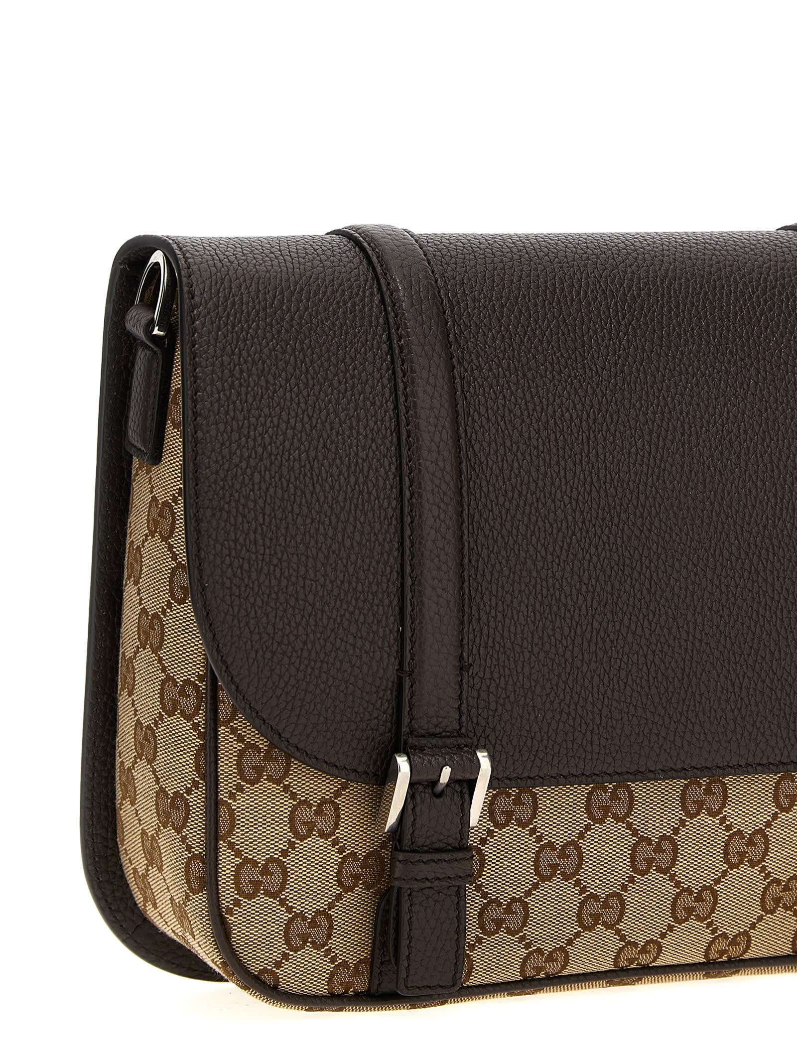 Shop Gucci Gg Crossbody Bag In Brown