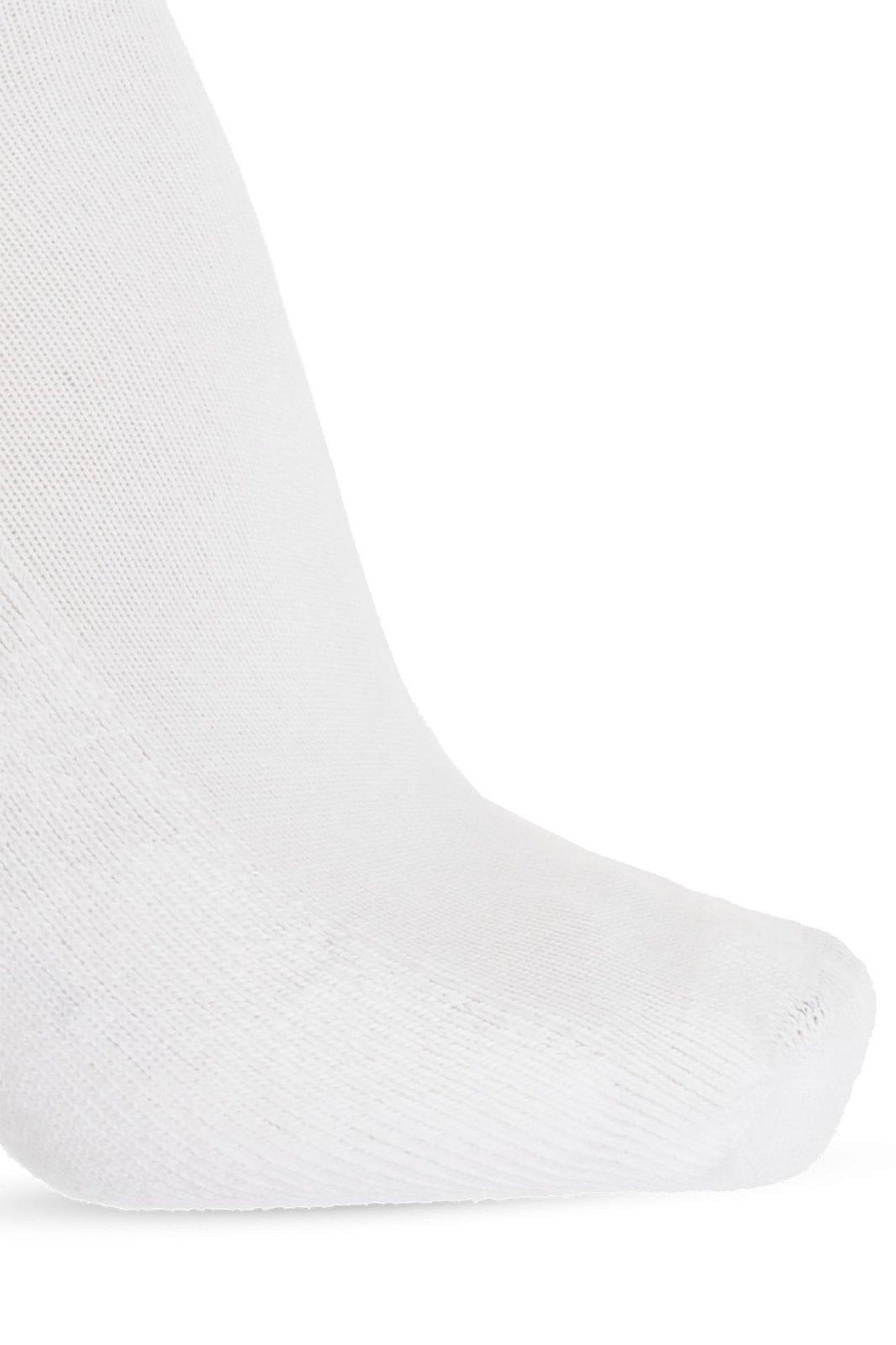 Shop Alexander Mcqueen Logo Skull Intarsia Knitted Socks In White/black