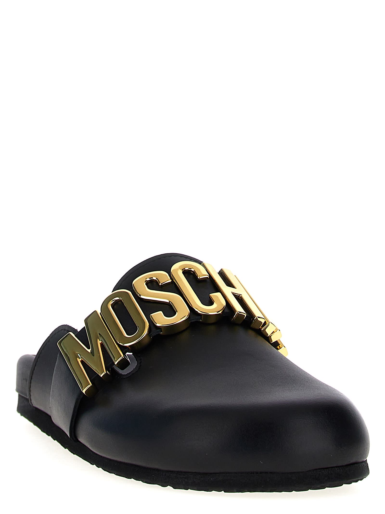 Shop Moschino Birky Sabots In Black