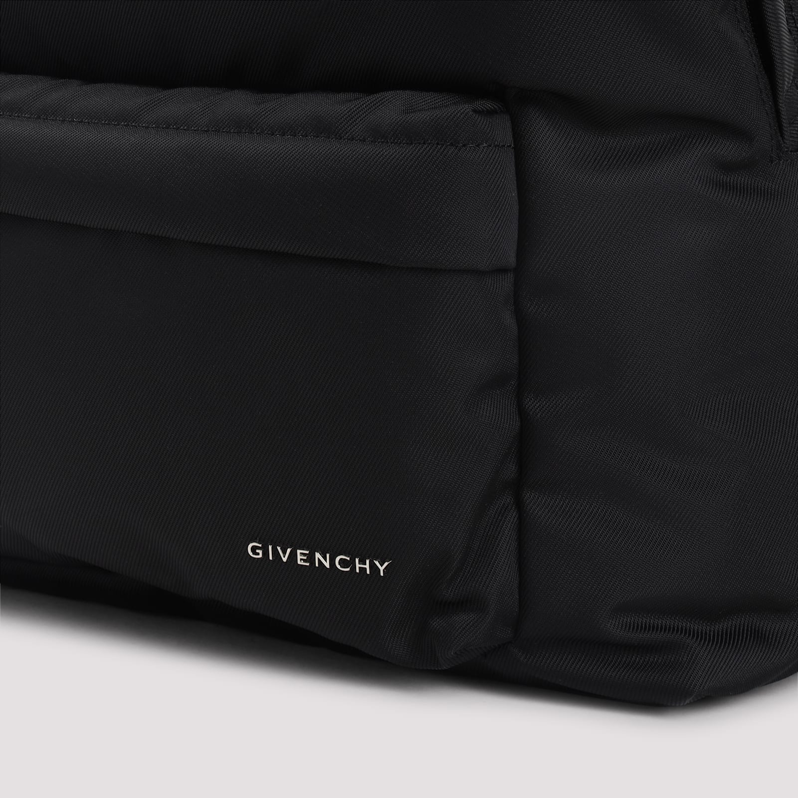 Givenchy Rounded Silhouette Backpack With Subtle Logo Detail In Black