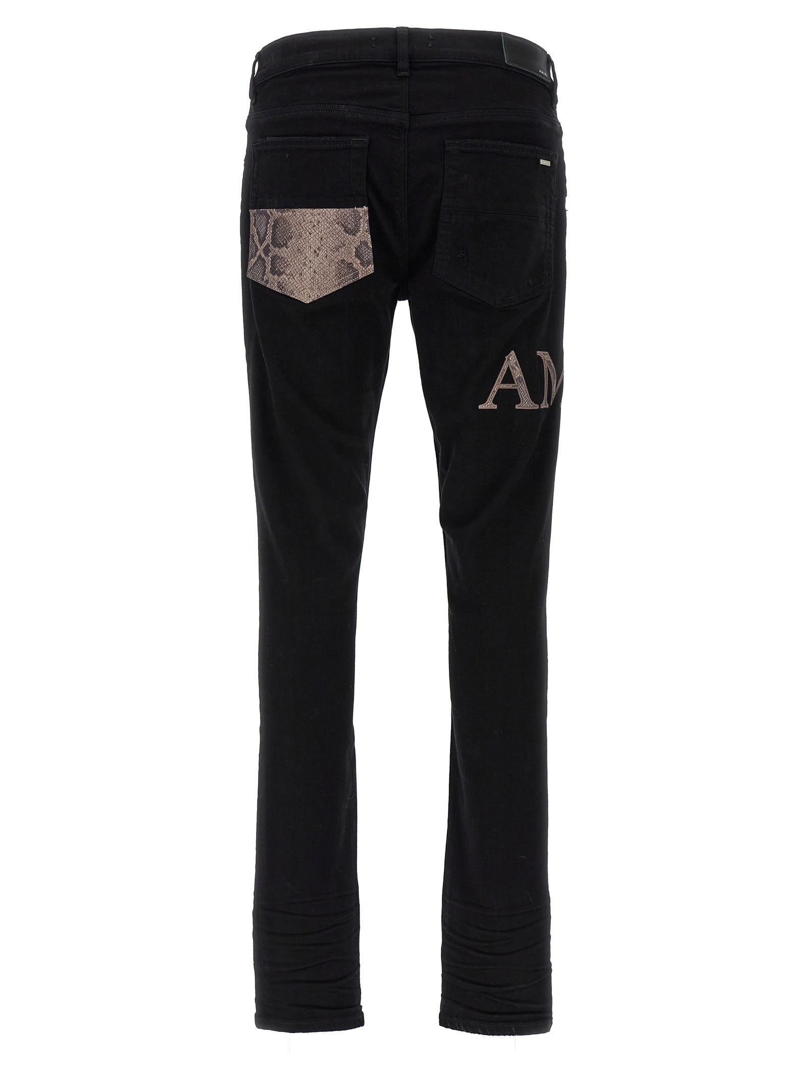 Shop Amiri Snake Logo Jeans In Black